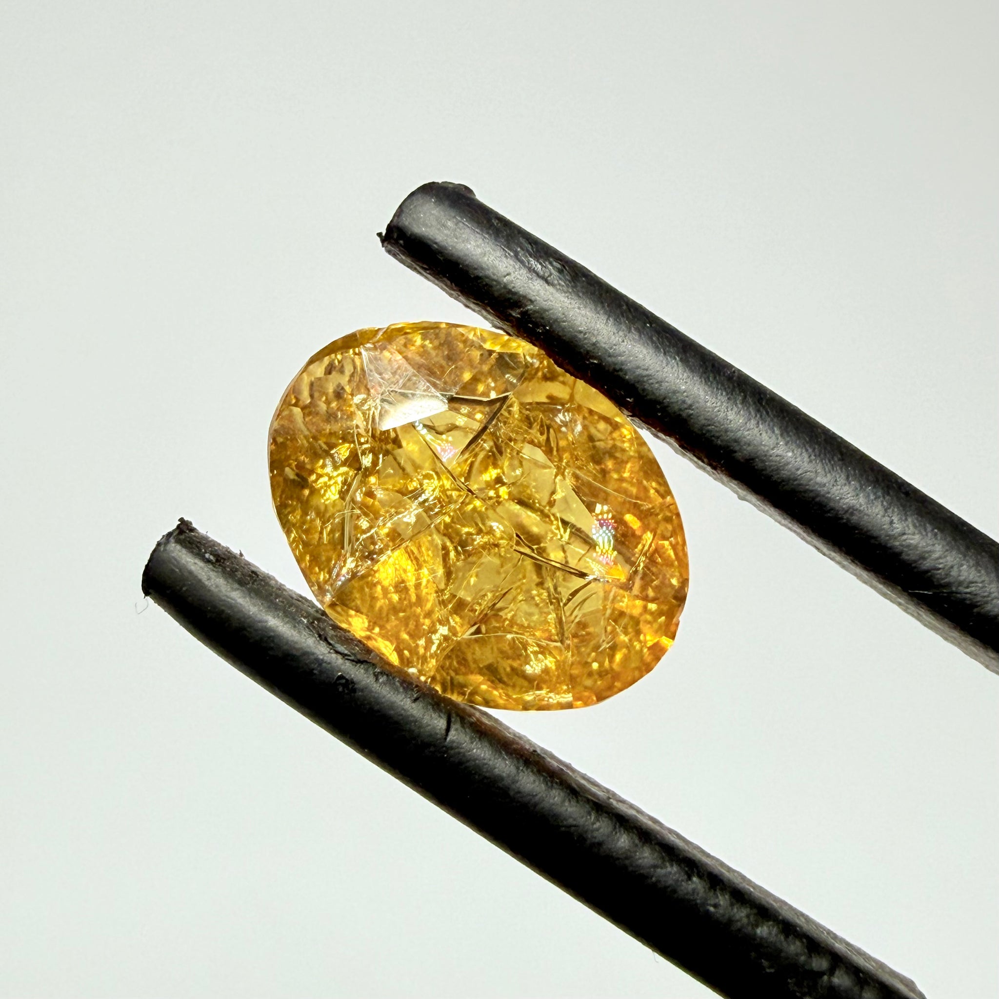 Ethiopian Opal that we cut 17 years ago and fractured internally, seems stable and none of the facets have broken, we thought it was quite pretty, from the initial Ethiopian Opal deposit, 1.43ct, Ethiopia, Untreated Unheated