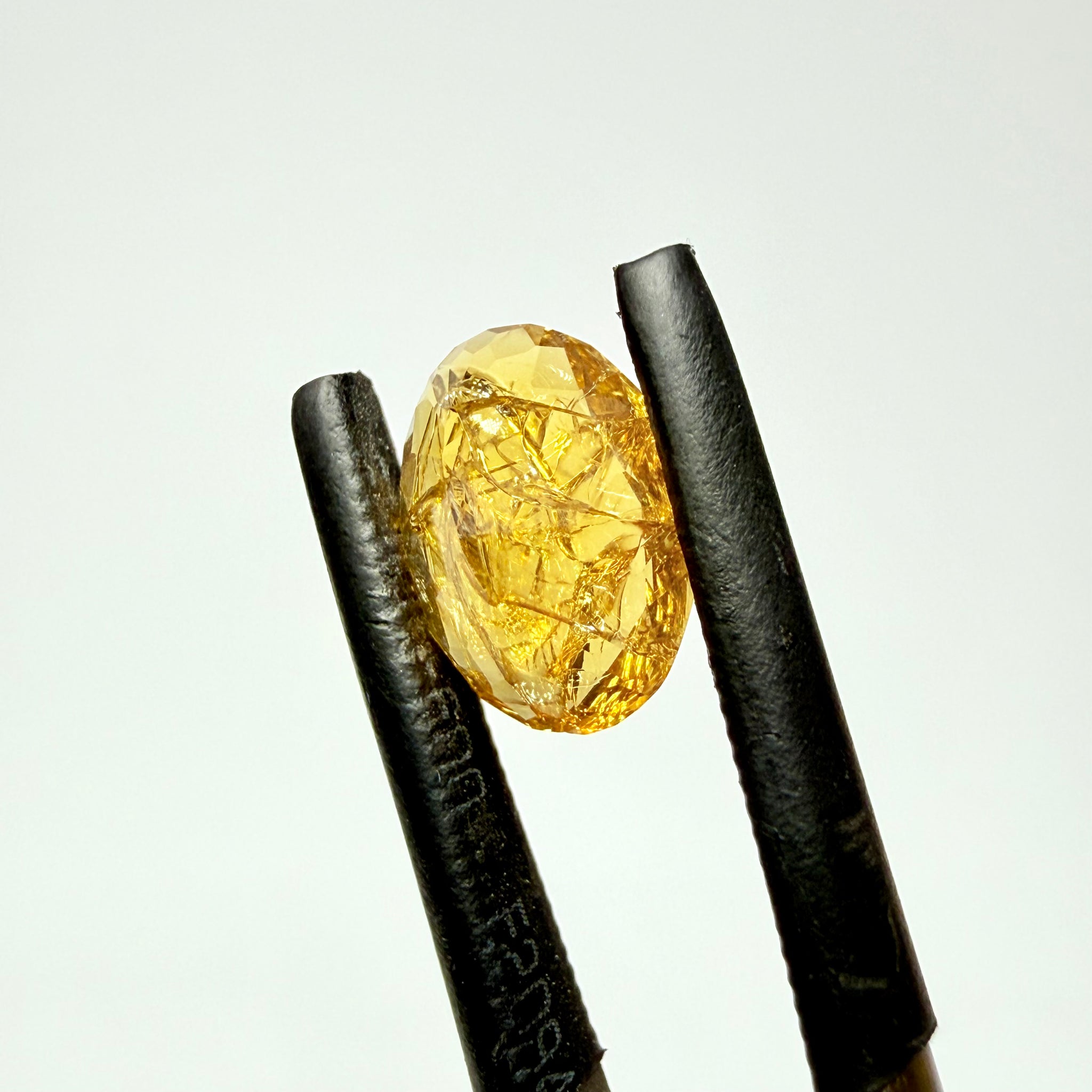 Ethiopian Opal that we cut 17 years ago and fractured internally, seems stable and none of the facets have broken, we thought it was quite pretty, from the initial Ethiopian Opal deposit, 1.43ct, Ethiopia, Untreated Unheated
