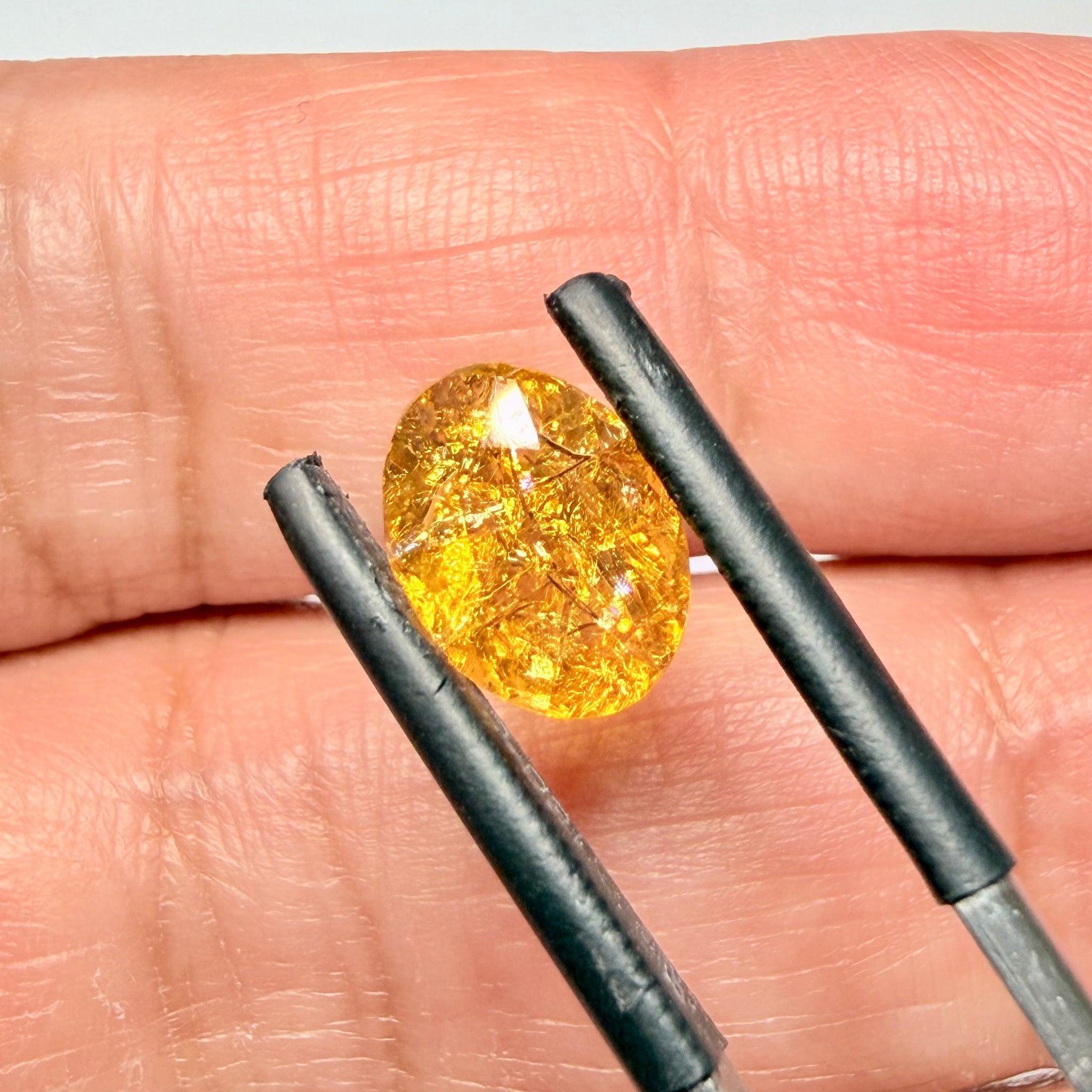 Ethiopian Opal that we cut 17 years ago and fractured internally, seems stable and none of the facets have broken, we thought it was quite pretty, from the initial Ethiopian Opal deposit, 1.43ct, Ethiopia, Untreated Unheated