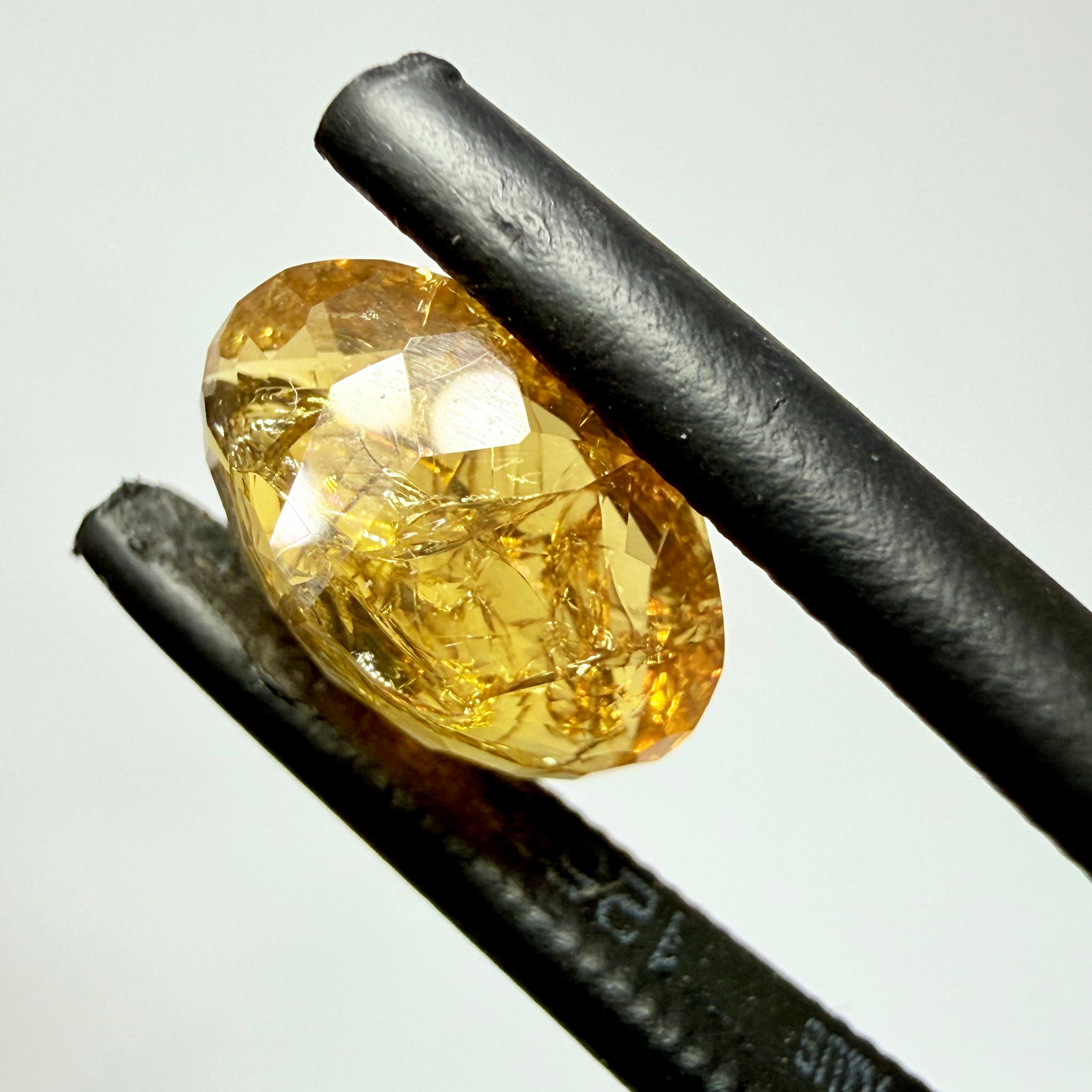Ethiopian Opal that we cut 17 years ago and fractured internally, seems stable and none of the facets have broken, we thought it was quite pretty, from the initial Ethiopian Opal deposit, 1.43ct, Ethiopia, Untreated Unheated