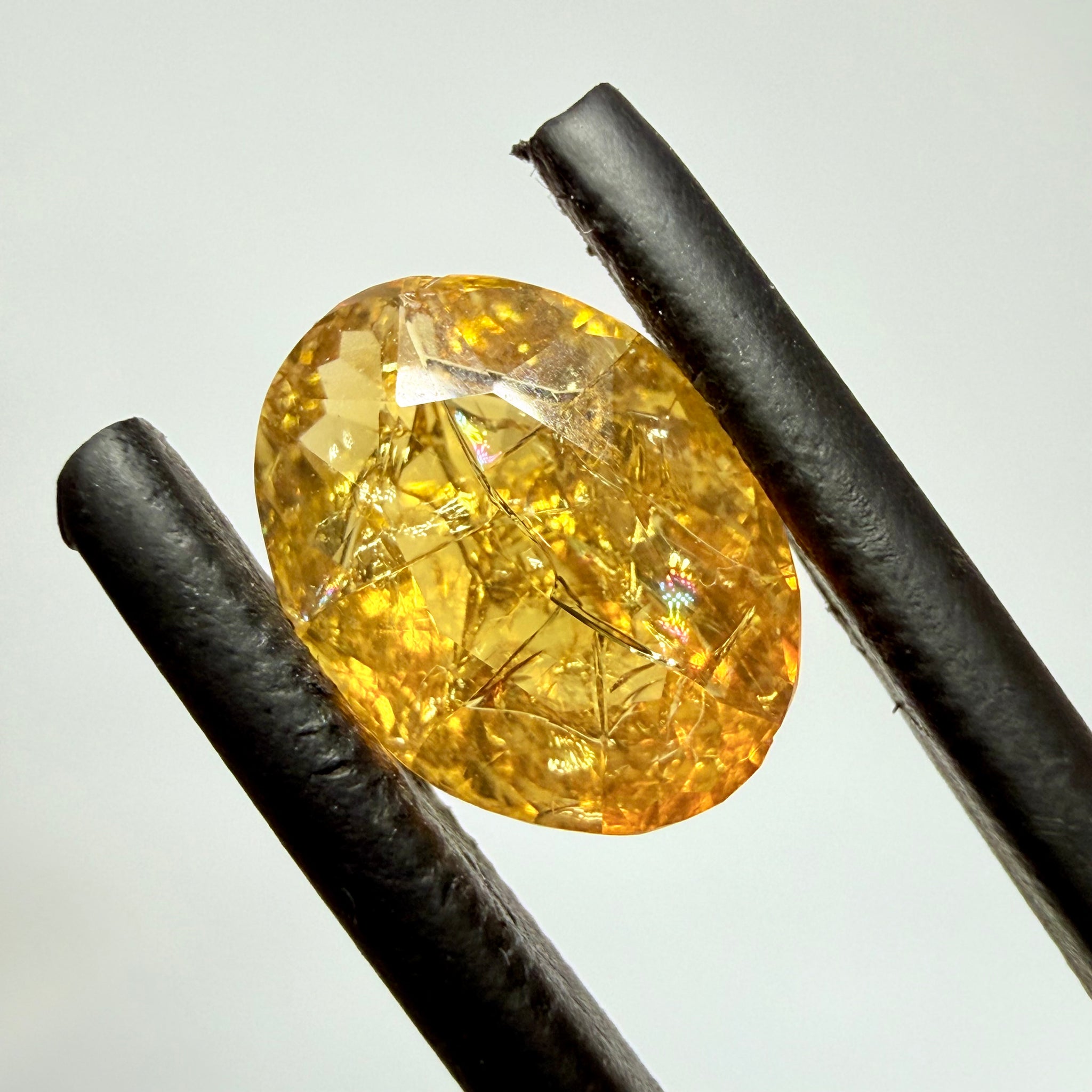 Ethiopian Opal that we cut 17 years ago and fractured internally, seems stable and none of the facets have broken, we thought it was quite pretty, from the initial Ethiopian Opal deposit, 1.43ct, Ethiopia, Untreated Unheated