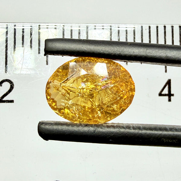 Ethiopian Opal that we cut 17 years ago and fractured internally, seems stable and none of the facets have broken, we thought it was quite pretty, from the initial Ethiopian Opal deposit, 1.43ct, Ethiopia, Untreated Unheated