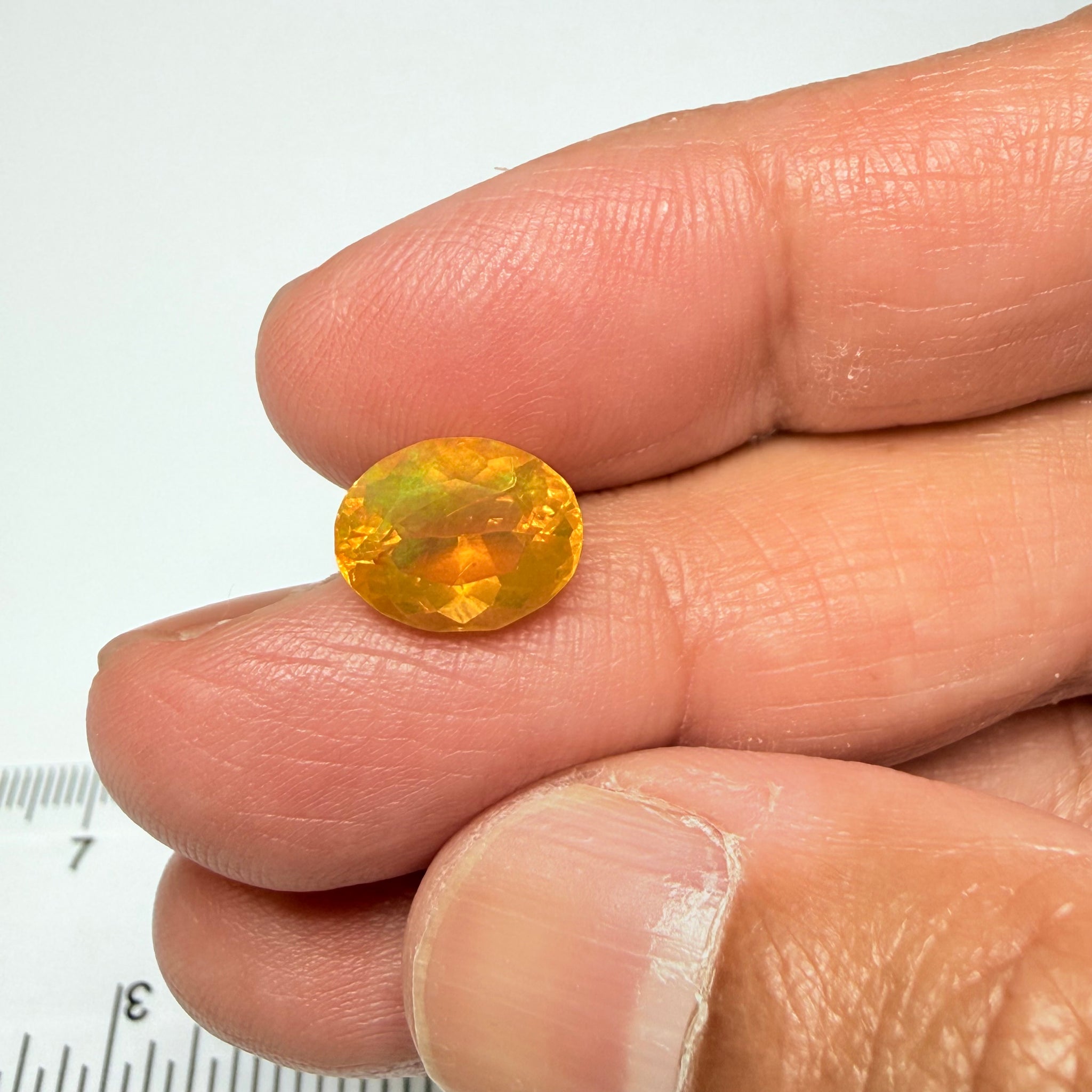 Ethiopian Opal that we cut 17 years ago and fractured internally, seems stable and none of the facets have broken, we thought it was quite pretty, from the initial Ethiopian Opal deposit, 2.00ct, Ethiopia, Untreated Unheated