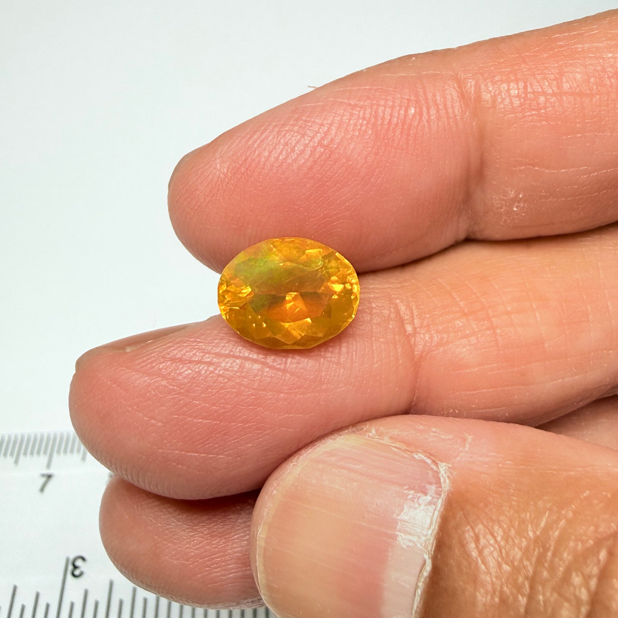 Ethiopian Opal that we cut 17 years ago and fractured internally, seems stable and none of the facets have broken, we thought it was quite pretty, from the initial Ethiopian Opal deposit, 2.00ct, Ethiopia, Untreated Unheated