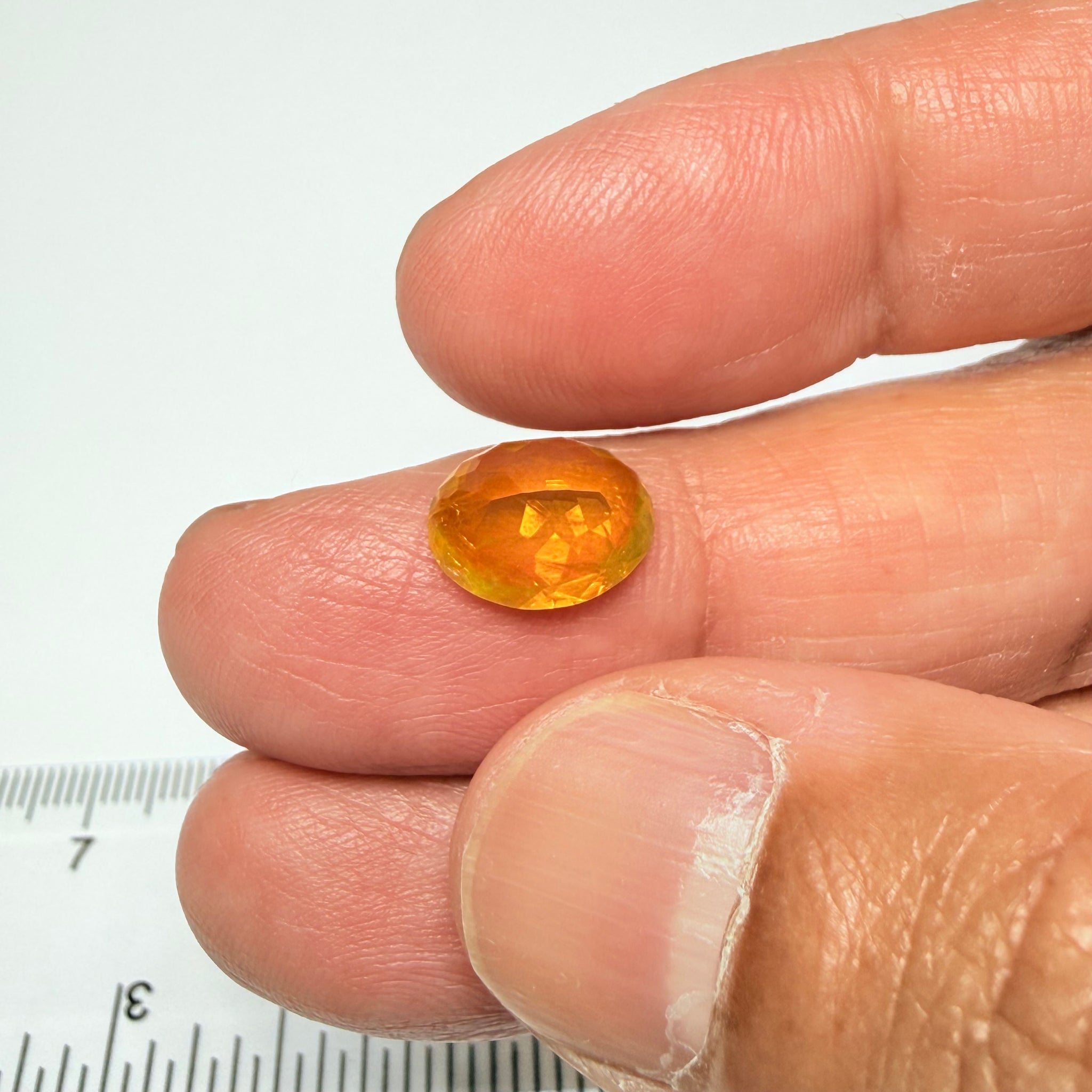 Ethiopian Opal that we cut 17 years ago and fractured internally, seems stable and none of the facets have broken, we thought it was quite pretty, from the initial Ethiopian Opal deposit, 2.00ct, Ethiopia, Untreated Unheated