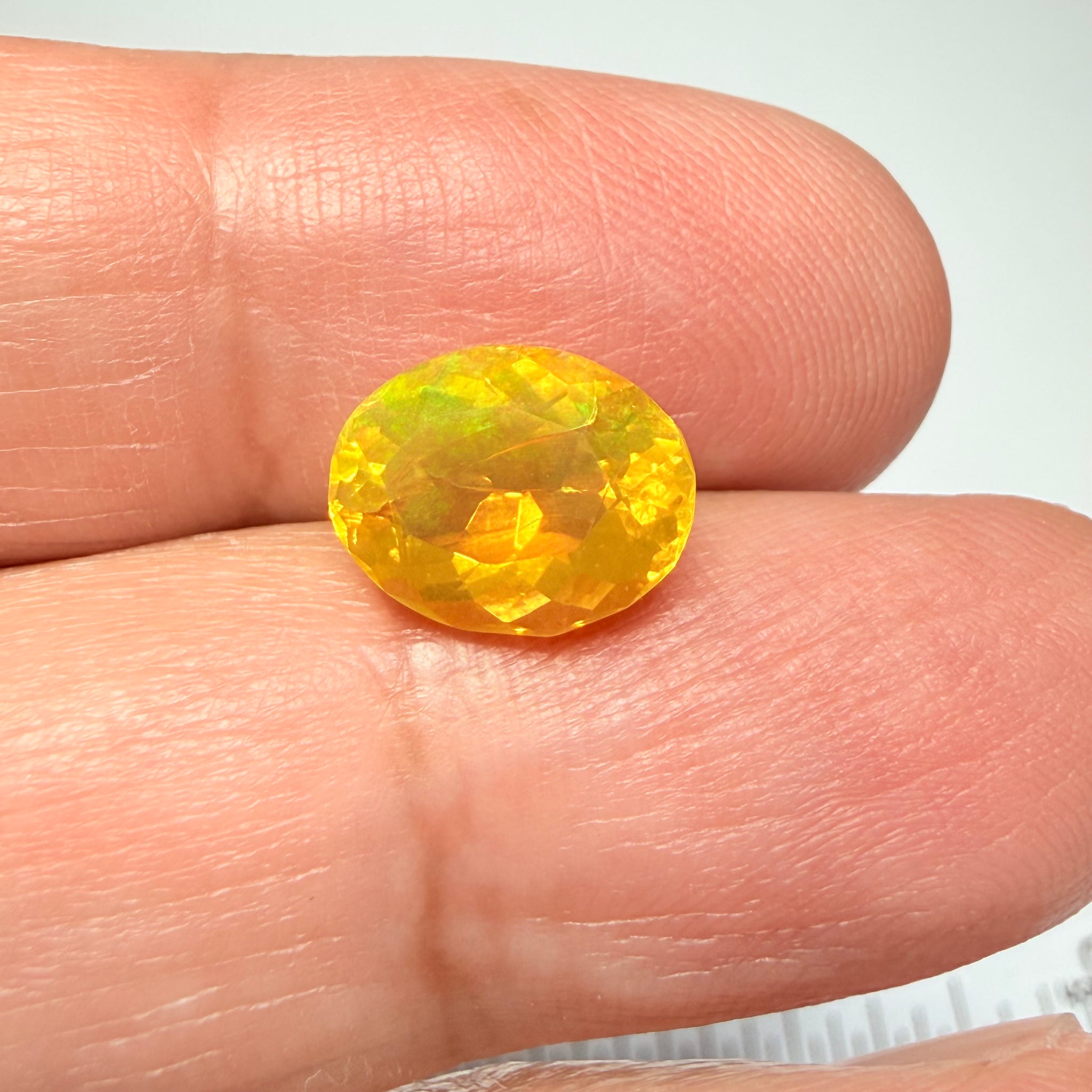 Ethiopian Opal that we cut 17 years ago and fractured internally, seems stable and none of the facets have broken, we thought it was quite pretty, from the initial Ethiopian Opal deposit, 2.00ct, Ethiopia, Untreated Unheated