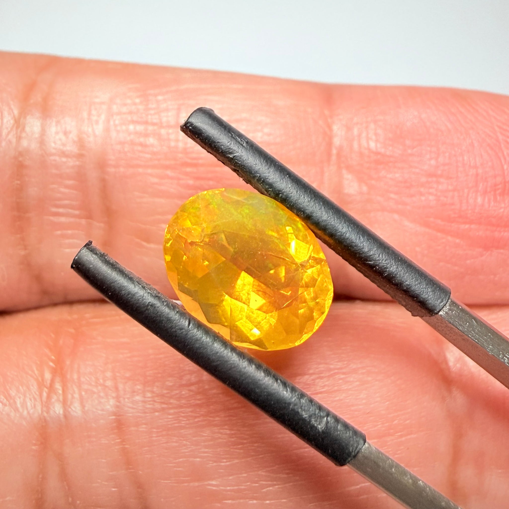 Ethiopian Opal that we cut 17 years ago and fractured internally, seems stable and none of the facets have broken, we thought it was quite pretty, from the initial Ethiopian Opal deposit, 2.00ct, Ethiopia, Untreated Unheated