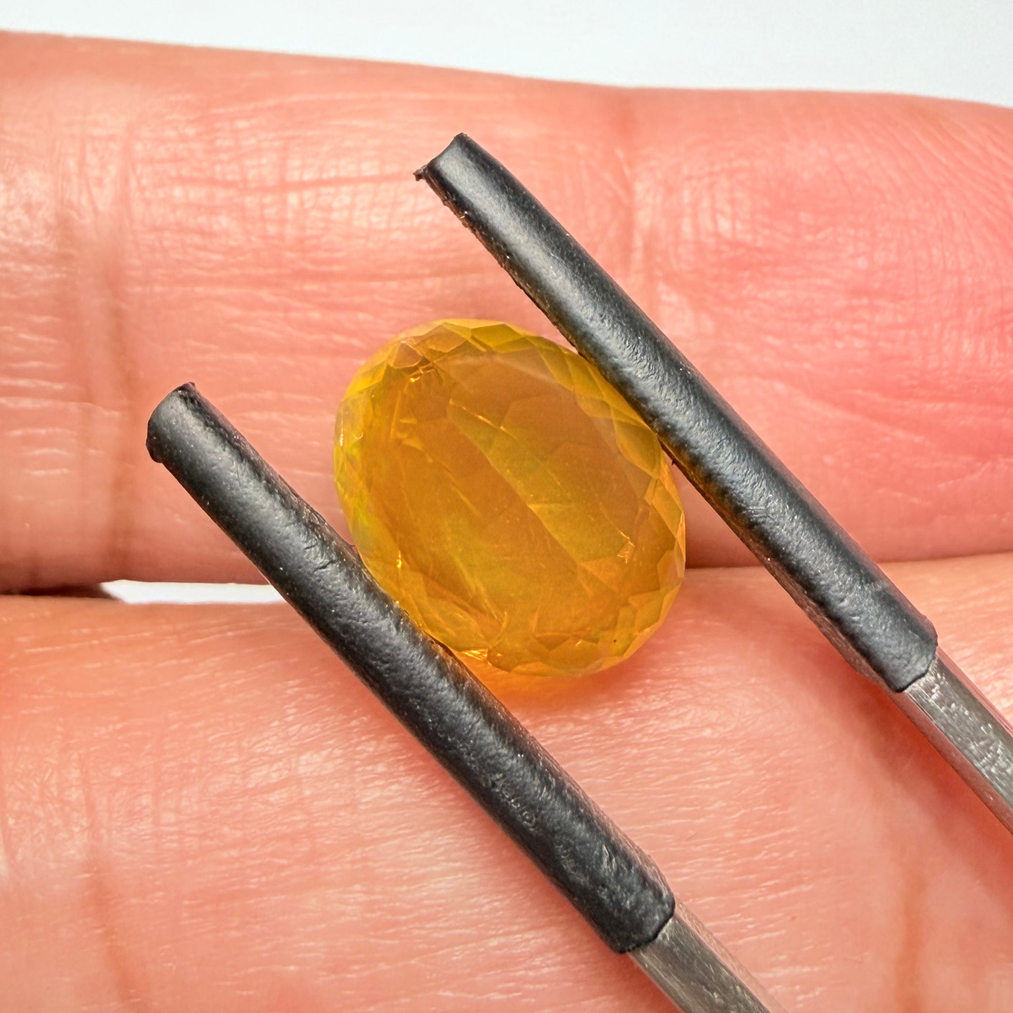 Ethiopian Opal that we cut 17 years ago and fractured internally, seems stable and none of the facets have broken, we thought it was quite pretty, from the initial Ethiopian Opal deposit, 2.00ct, Ethiopia, Untreated Unheated