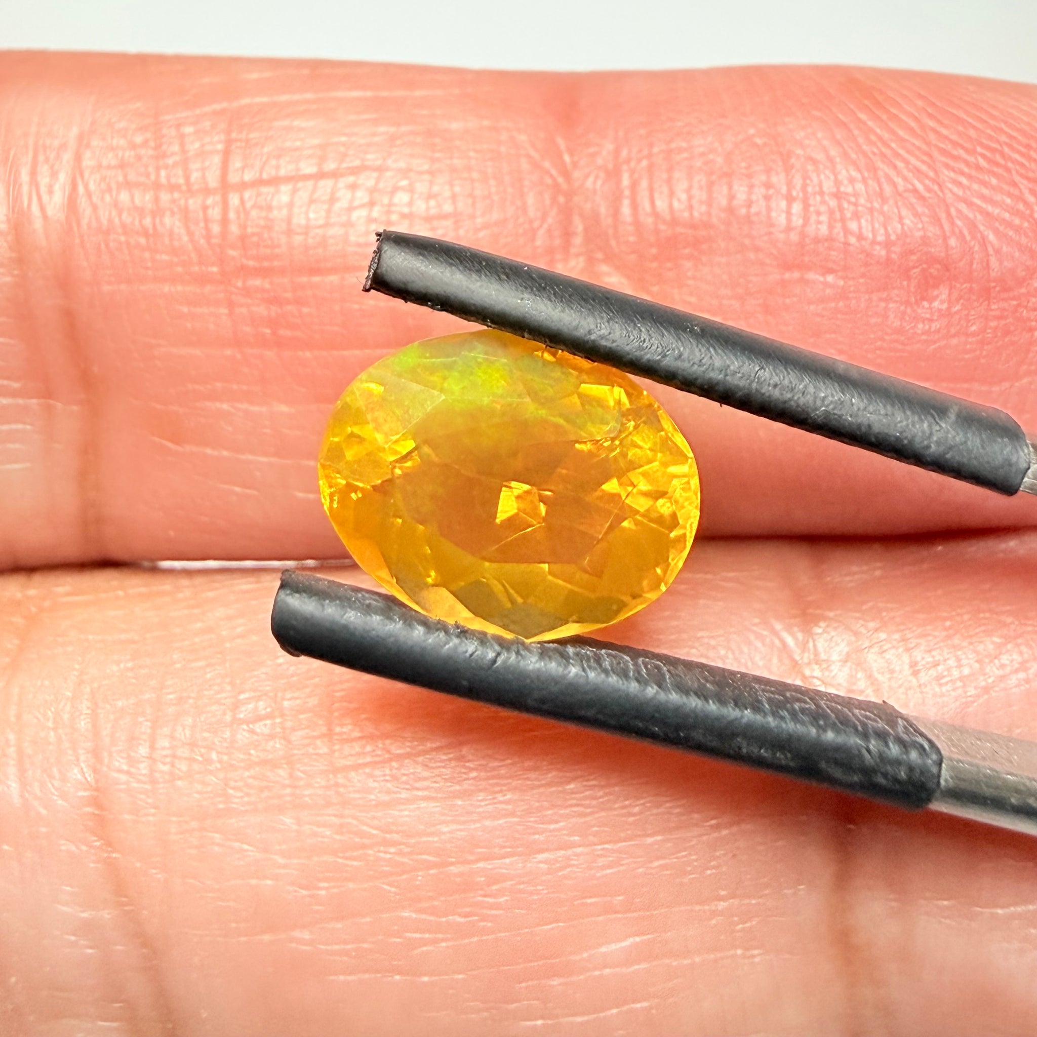 Ethiopian Opal that we cut 17 years ago and fractured internally, seems stable and none of the facets have broken, we thought it was quite pretty, from the initial Ethiopian Opal deposit, 2.00ct, Ethiopia, Untreated Unheated