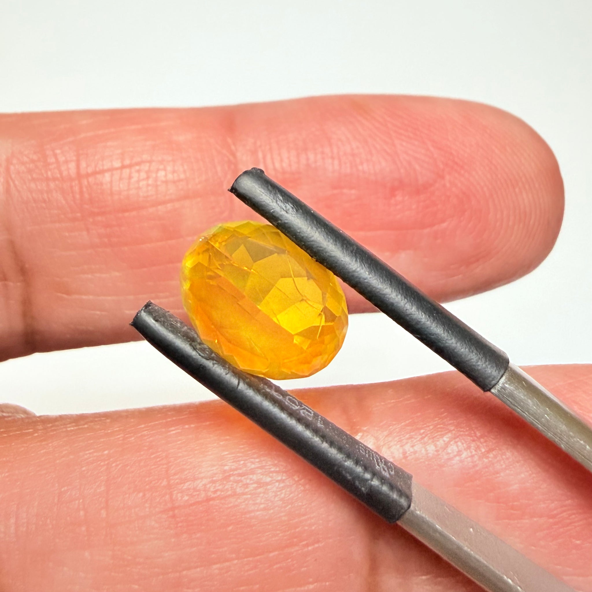 Ethiopian Opal that we cut 17 years ago and fractured internally, seems stable and none of the facets have broken, we thought it was quite pretty, from the initial Ethiopian Opal deposit, 2.00ct, Ethiopia, Untreated Unheated