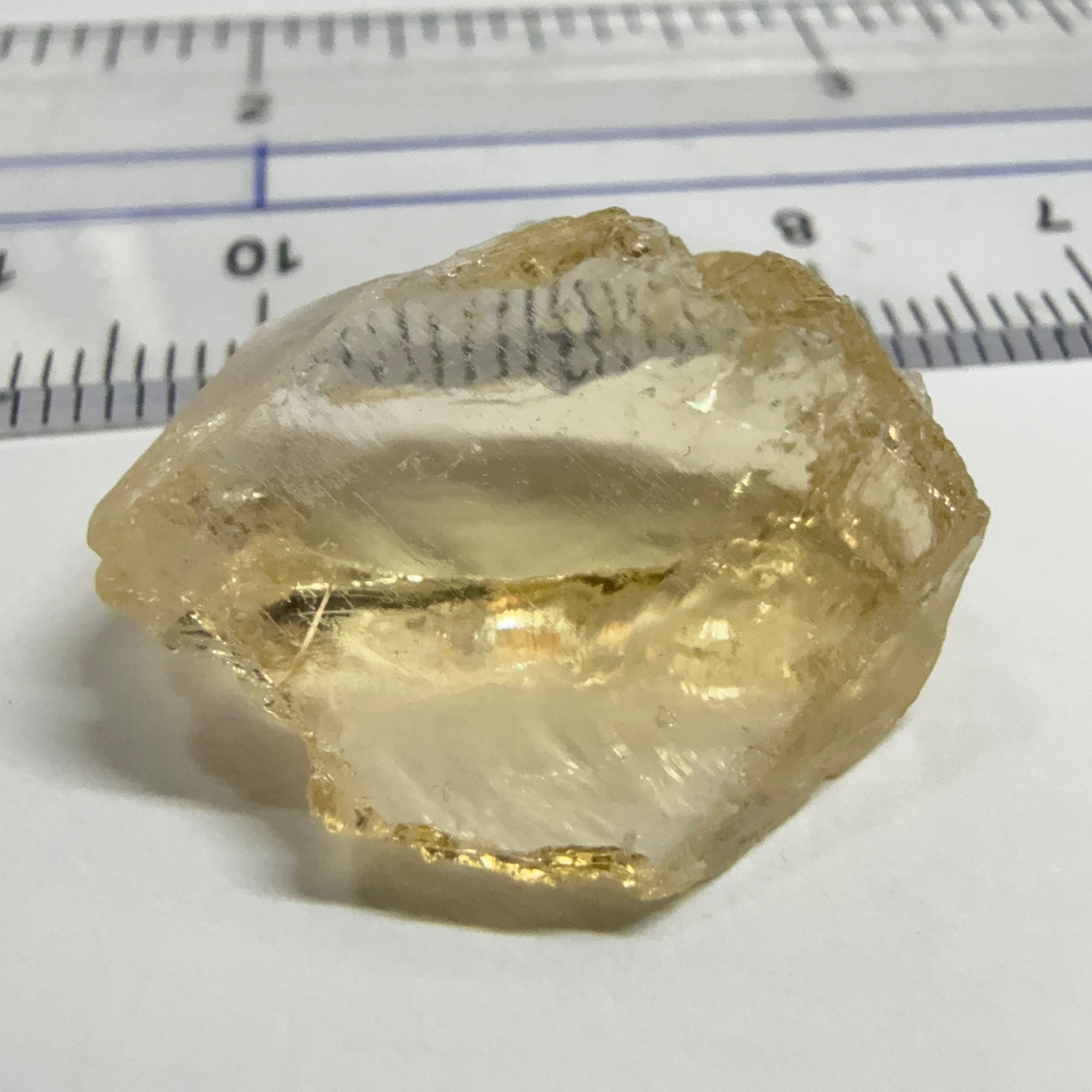 Citrine, 19.37ct, Zambia, Untreated Unheated, slight cracks on one end, rest VVS-IF, very flat shape but excellent for putting in jewellery as is