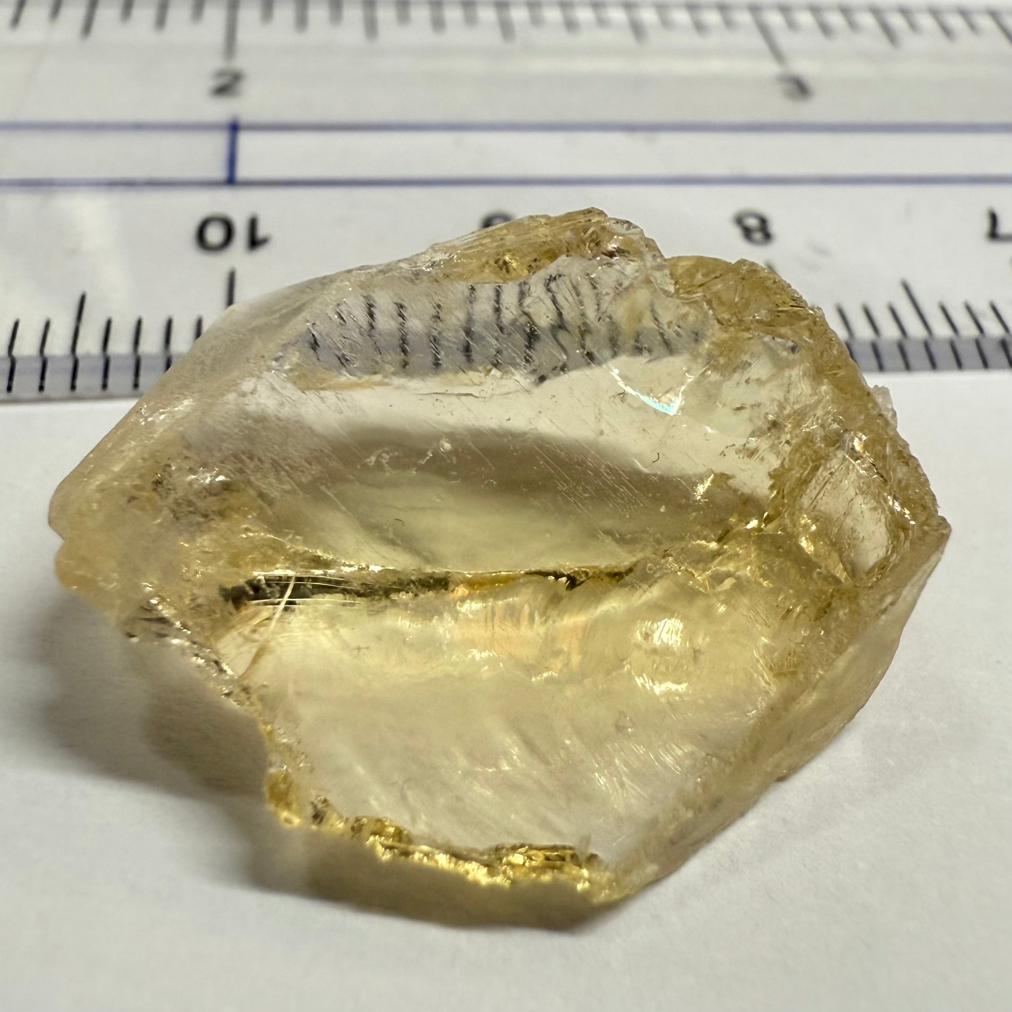 Citrine, 19.37ct, Zambia, Untreated Unheated, slight cracks on one end, rest VVS-IF, very flat shape but excellent for putting in jewellery as is