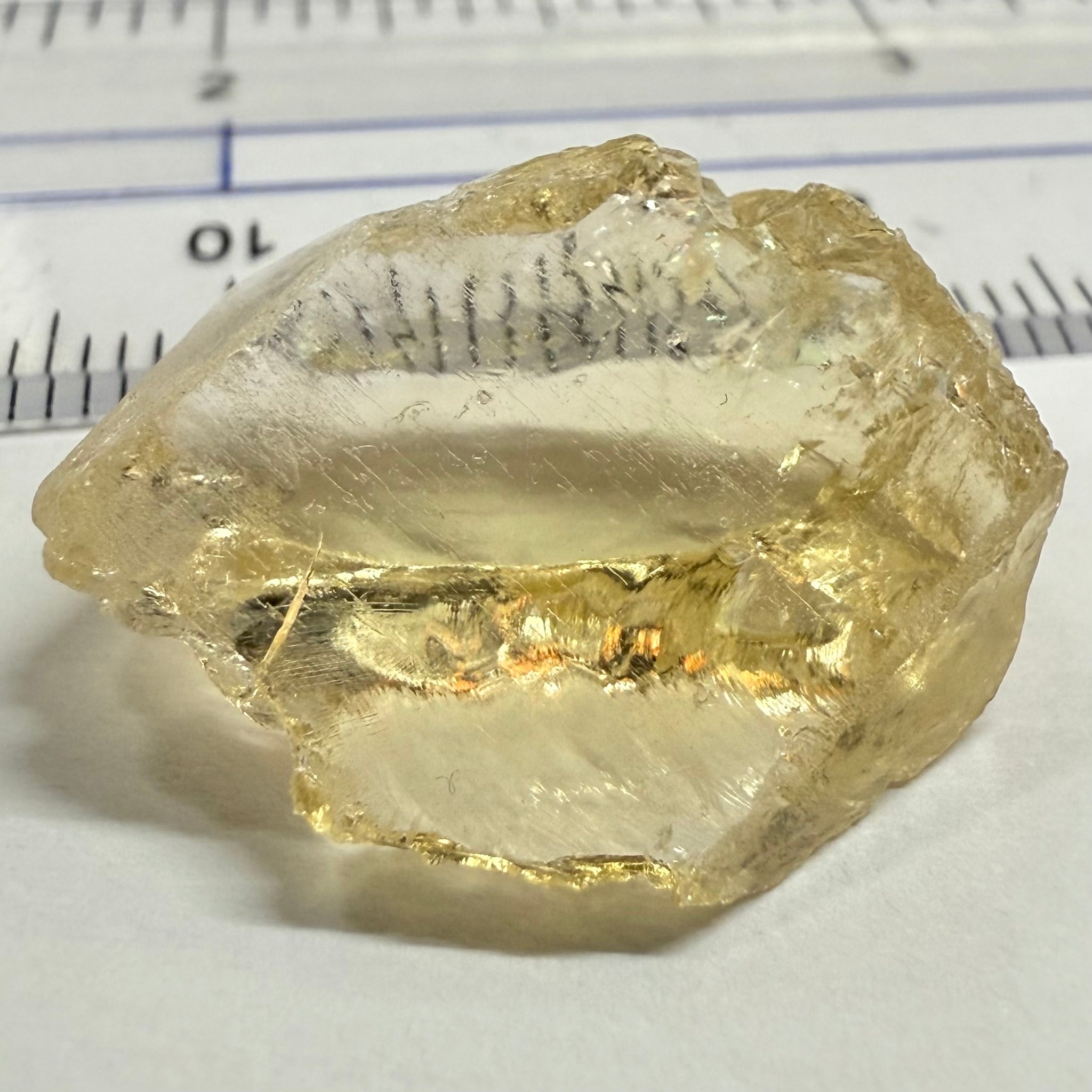 Citrine, 19.37ct, Zambia, Untreated Unheated, slight cracks on one end, rest VVS-IF, very flat shape but excellent for putting in jewellery as is