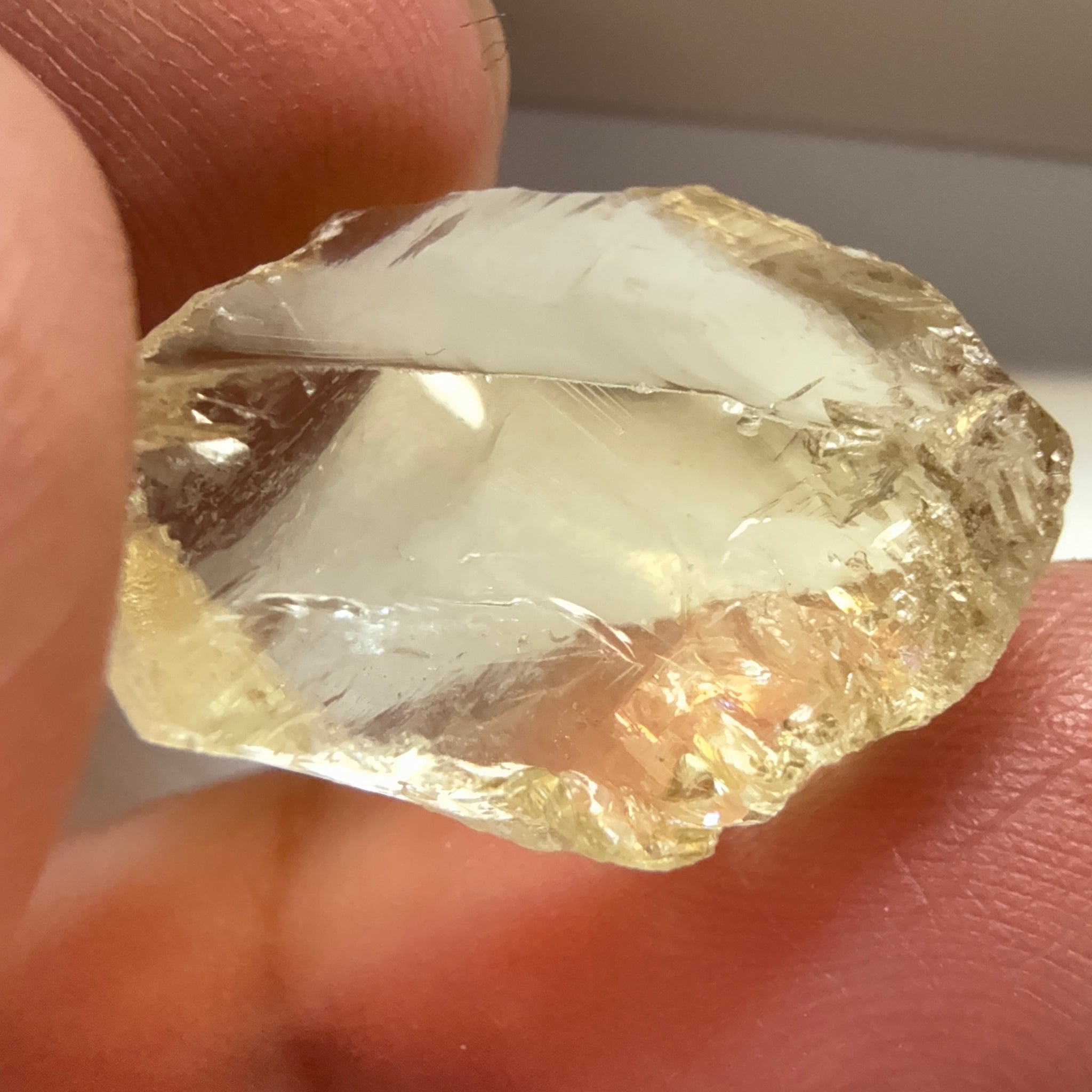 Citrine, 19.37ct, Zambia, Untreated Unheated, slight cracks on one end, rest VVS-IF, very flat shape but excellent for putting in jewellery as is