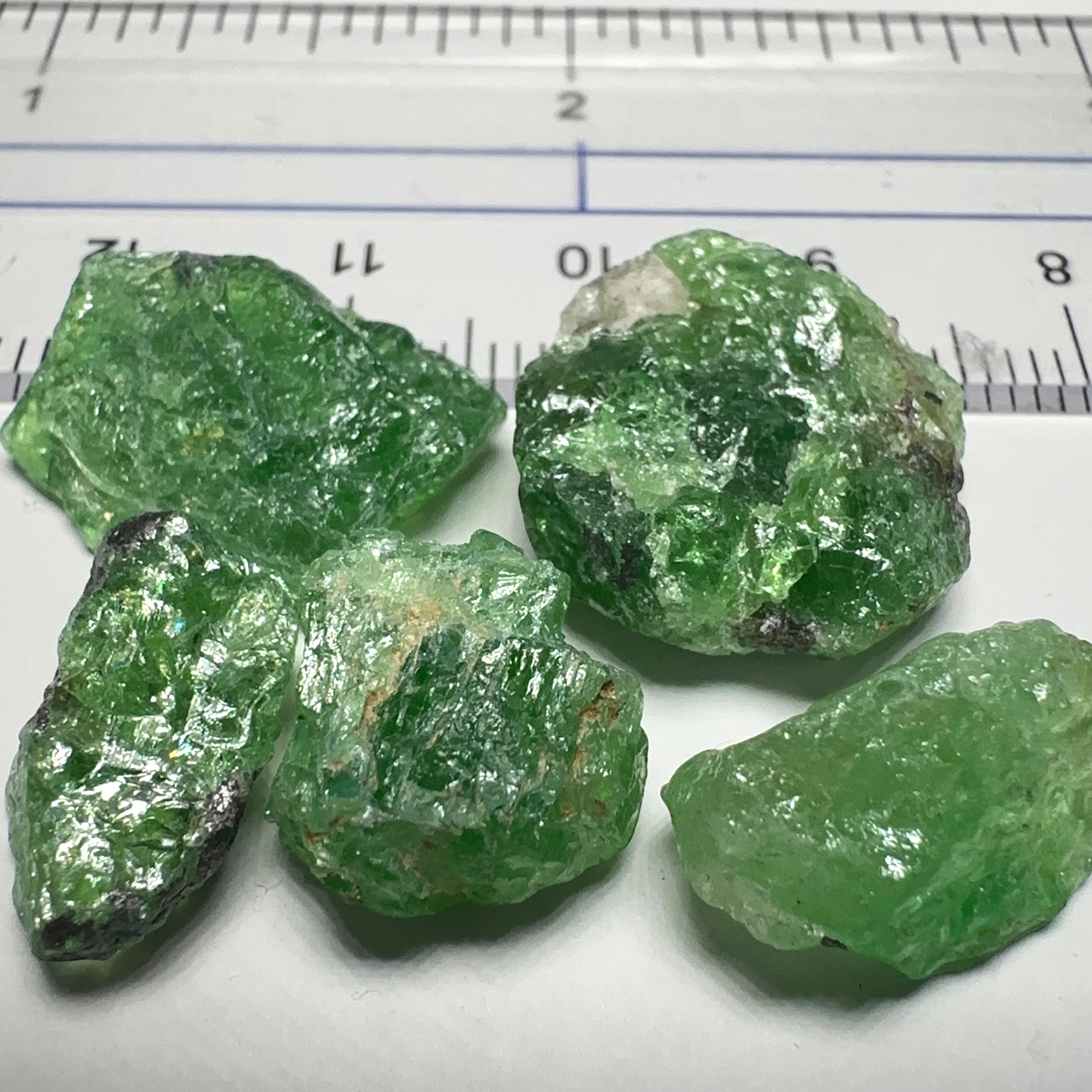 47.28ct Tsavorite Garnet Lot, Tanzania. Untreated Unheated. 5.37ct - 14.51ct. All included, slightly transparent, good for setting in jewellery as is or as specimens to add to a collection