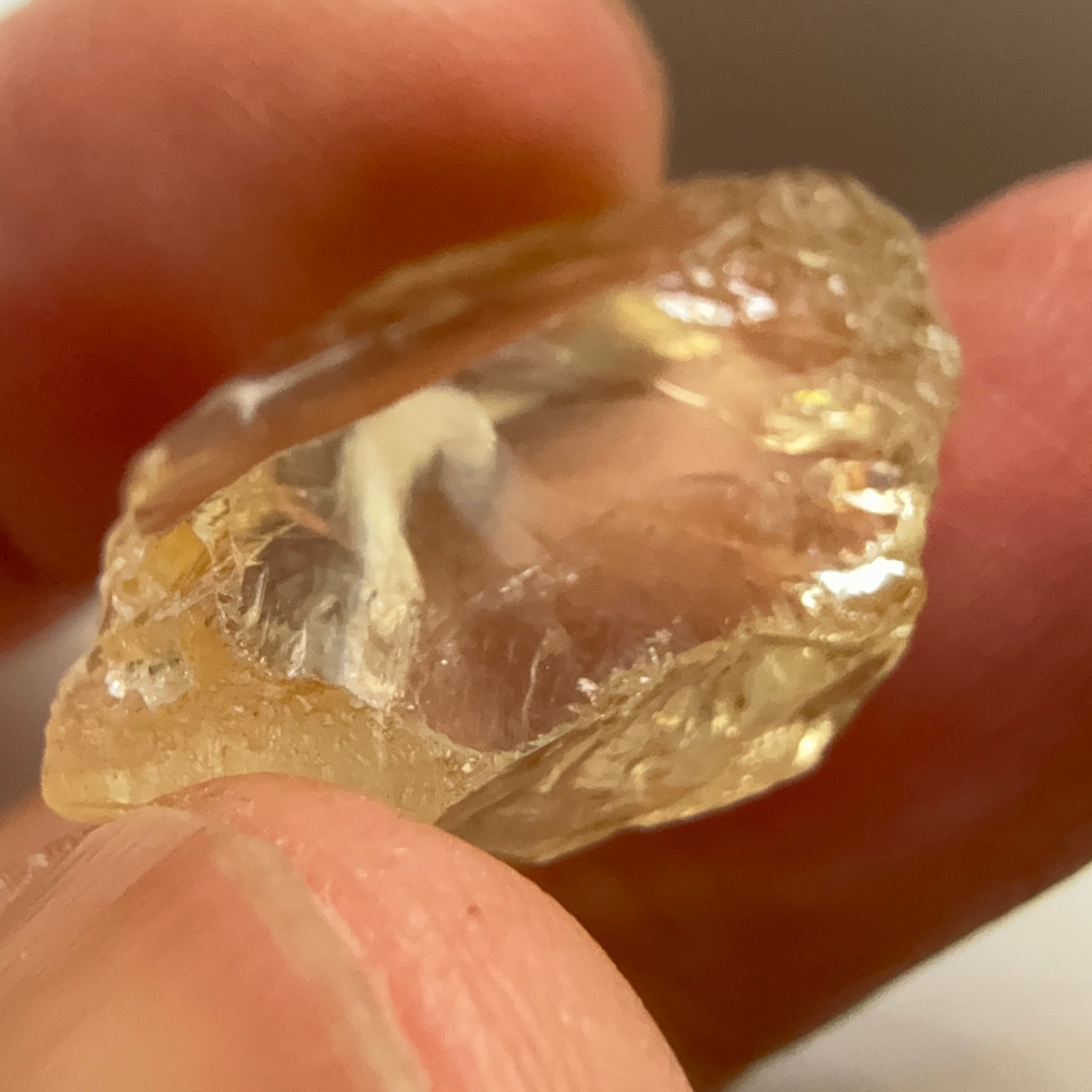 Citrine, 19.37ct, Zambia, Untreated Unheated, slight cracks on one end, rest VVS-IF, very flat shape but excellent for putting in jewellery as is