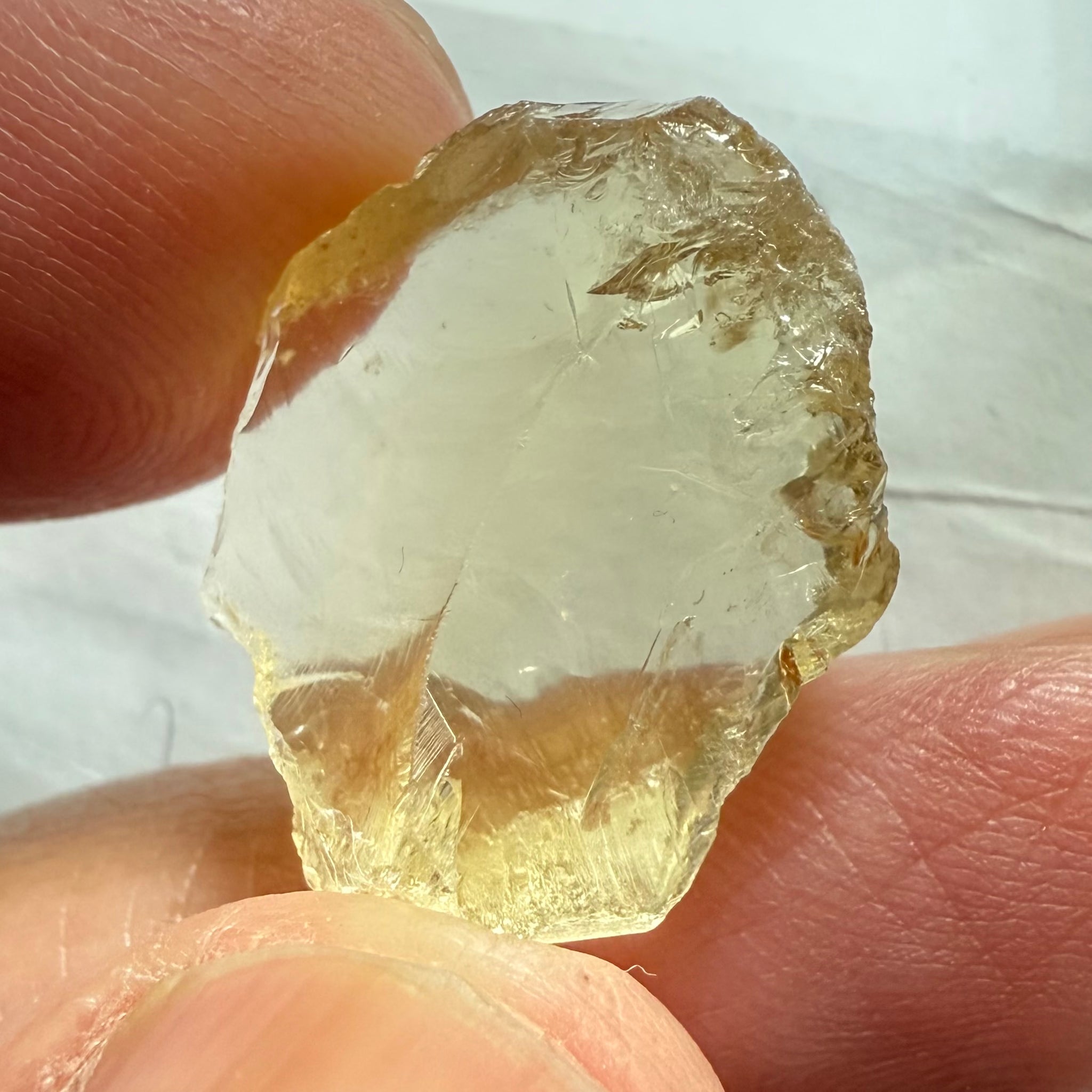 Citrine, 19.37ct, Zambia, Untreated Unheated, slight cracks on one end, rest VVS-IF, very flat shape but excellent for putting in jewellery as is