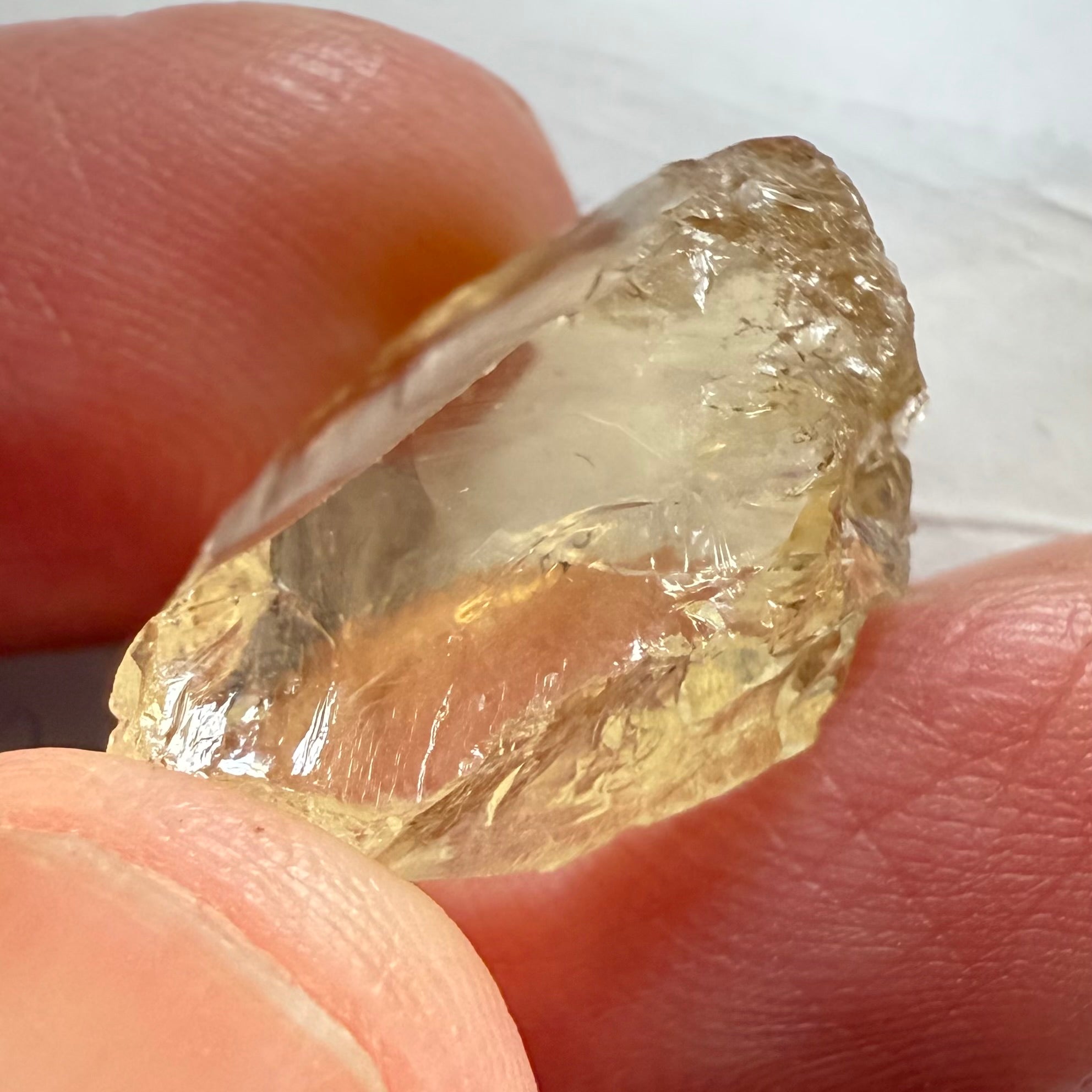 Citrine, 19.37ct, Zambia, Untreated Unheated, slight cracks on one end, rest VVS-IF, very flat shape but excellent for putting in jewellery as is