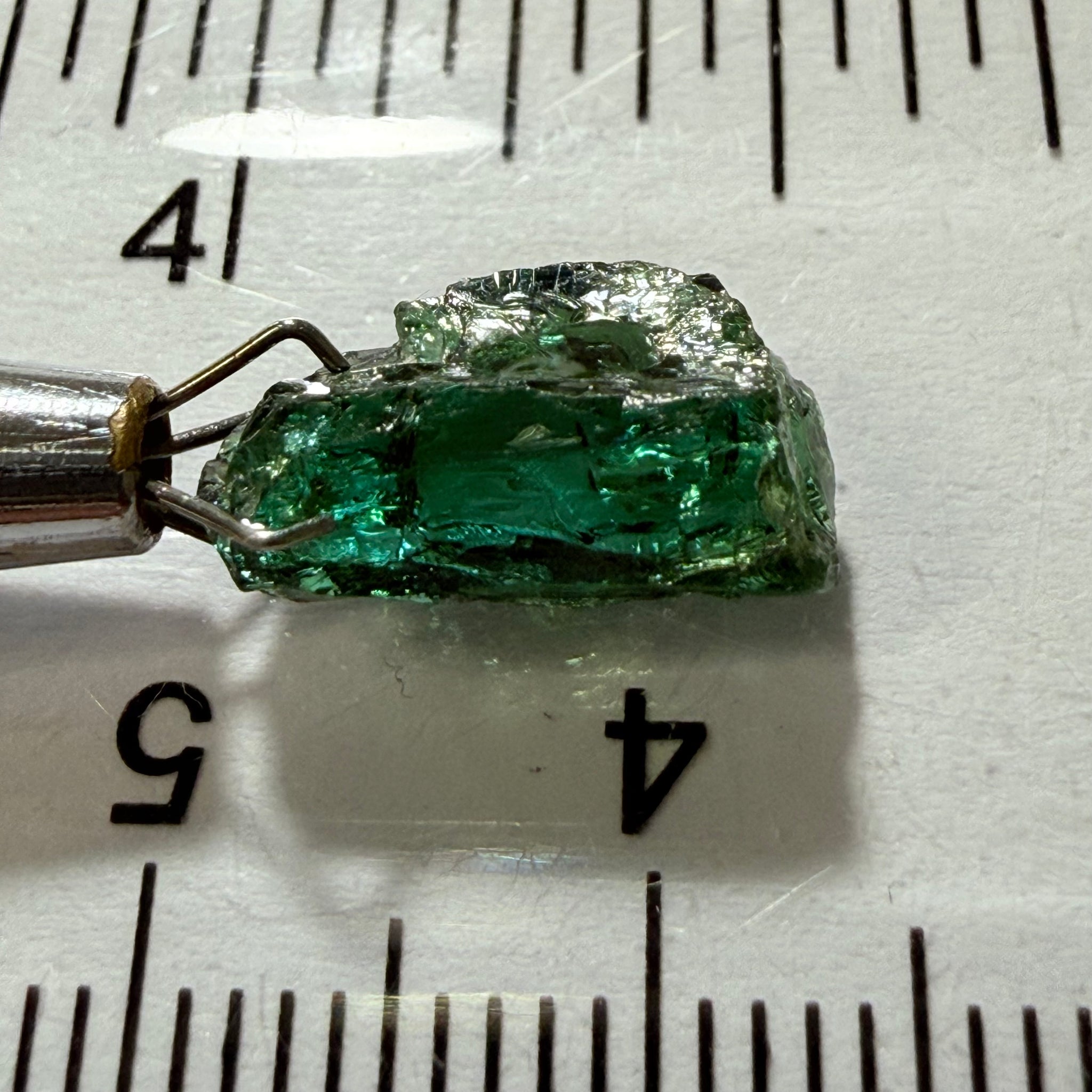 Tanzanite / Zoisite Crystal Specimen, 3.41ct, Merelani, Tanzania. Unheated Unheated, faceting portion in the center, major crack on the side circled in next pic