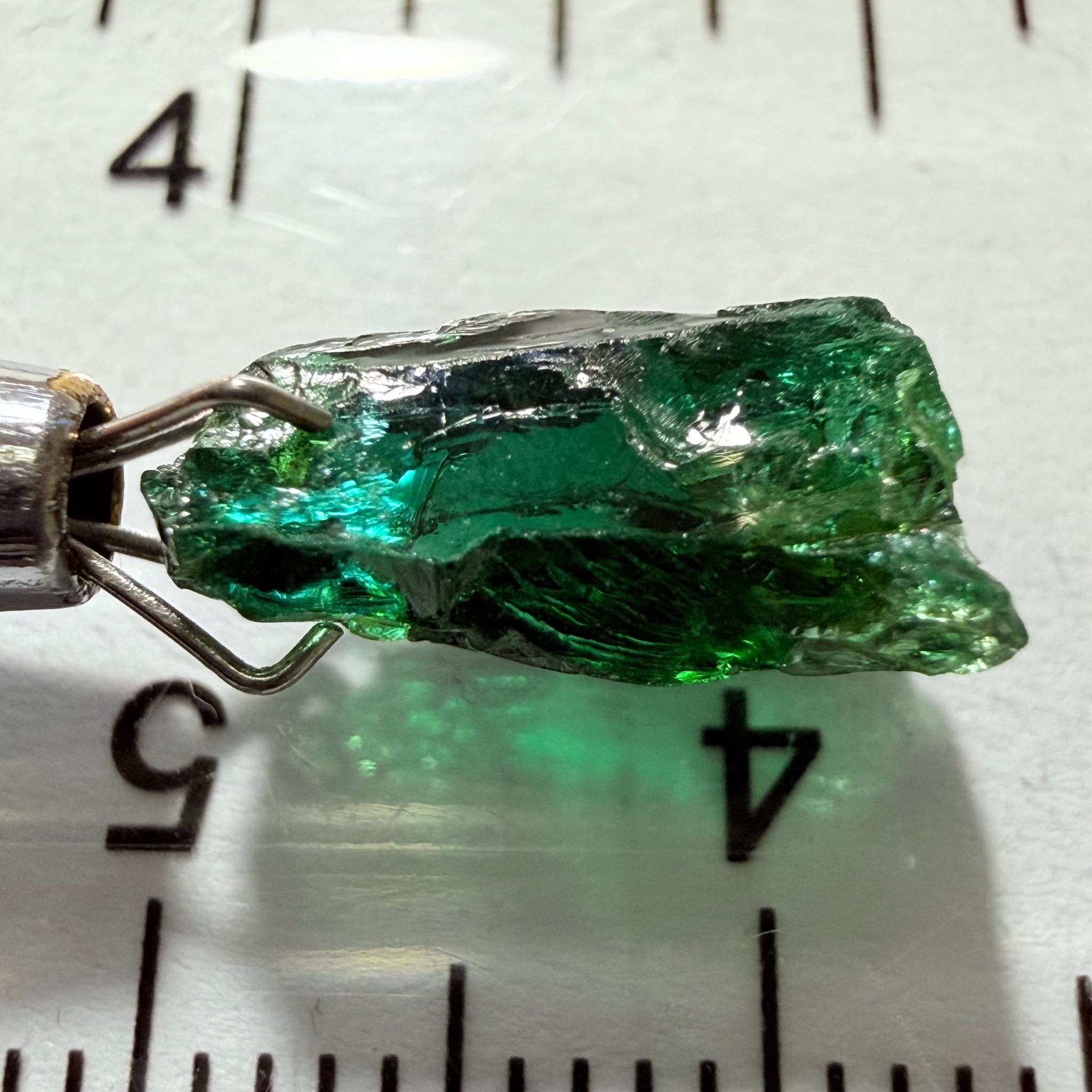 Tanzanite / Zoisite Crystal Specimen, 3.41ct, Merelani, Tanzania. Unheated Unheated, faceting portion in the center, major crack on the side circled in next pic