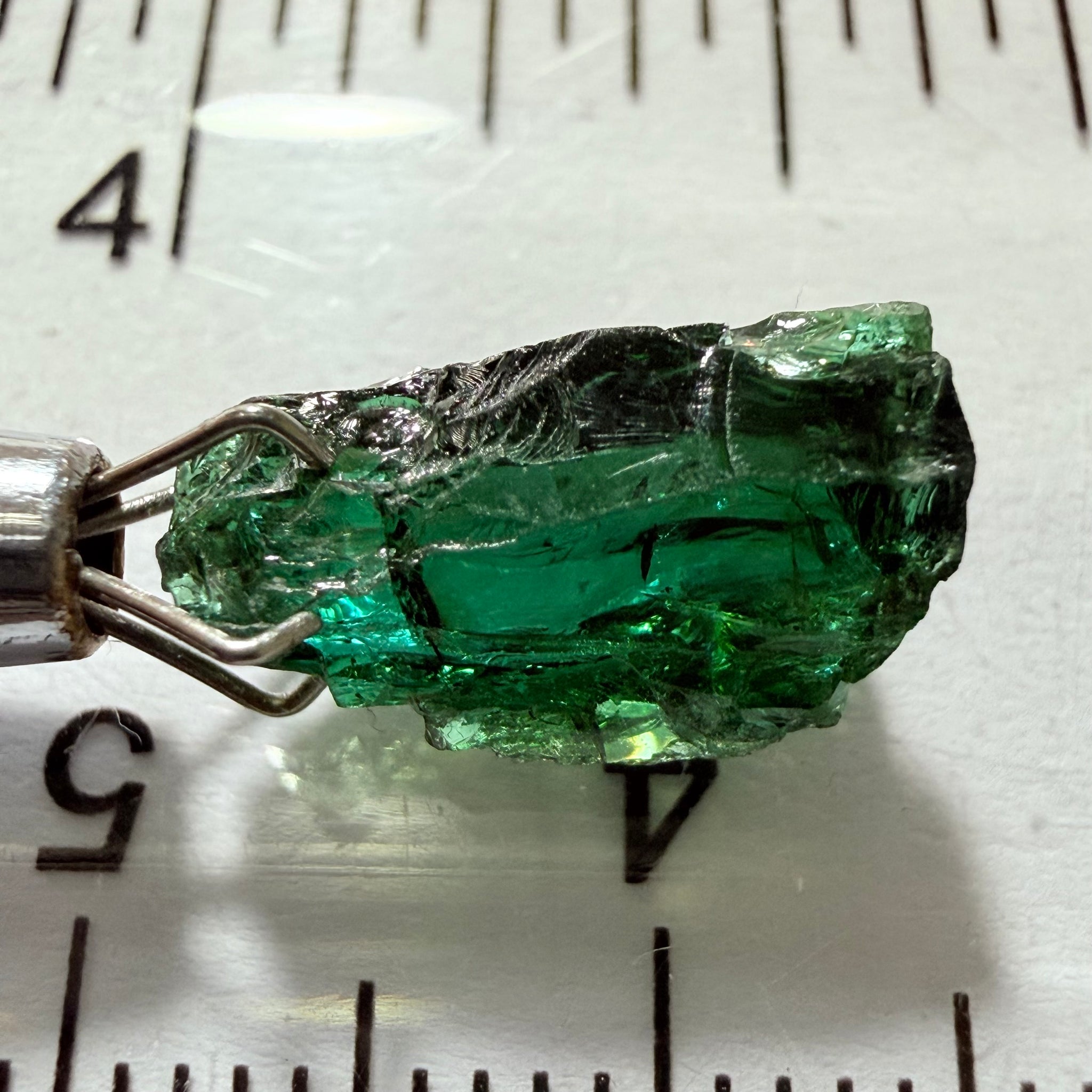 Tanzanite / Zoisite Crystal Specimen, 3.41ct, Merelani, Tanzania. Unheated Unheated, faceting portion in the center, major crack on the side circled in next pic