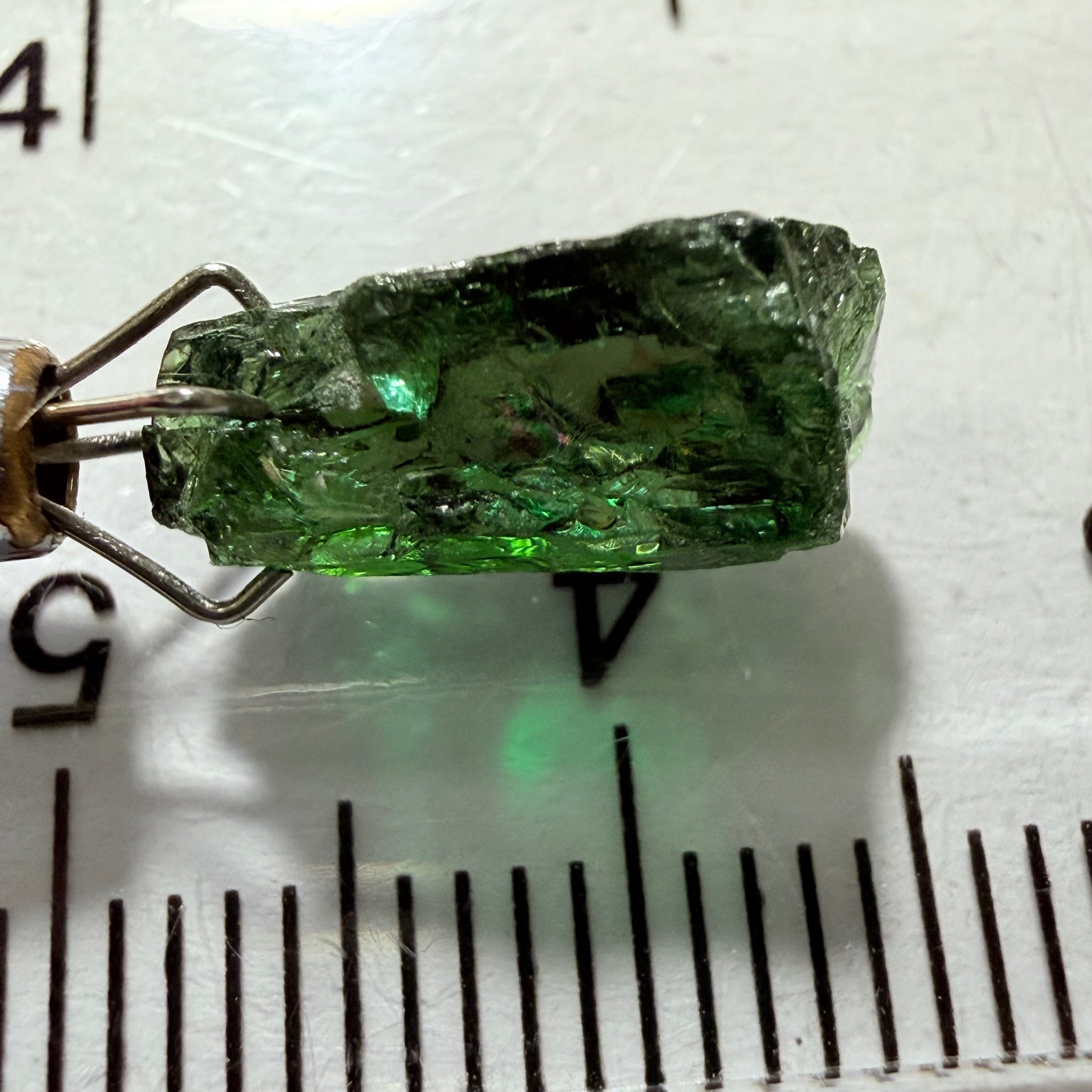 Tanzanite / Zoisite Crystal Specimen, 3.41ct, Merelani, Tanzania. Unheated Unheated, faceting portion in the center, major crack on the side circled in next pic