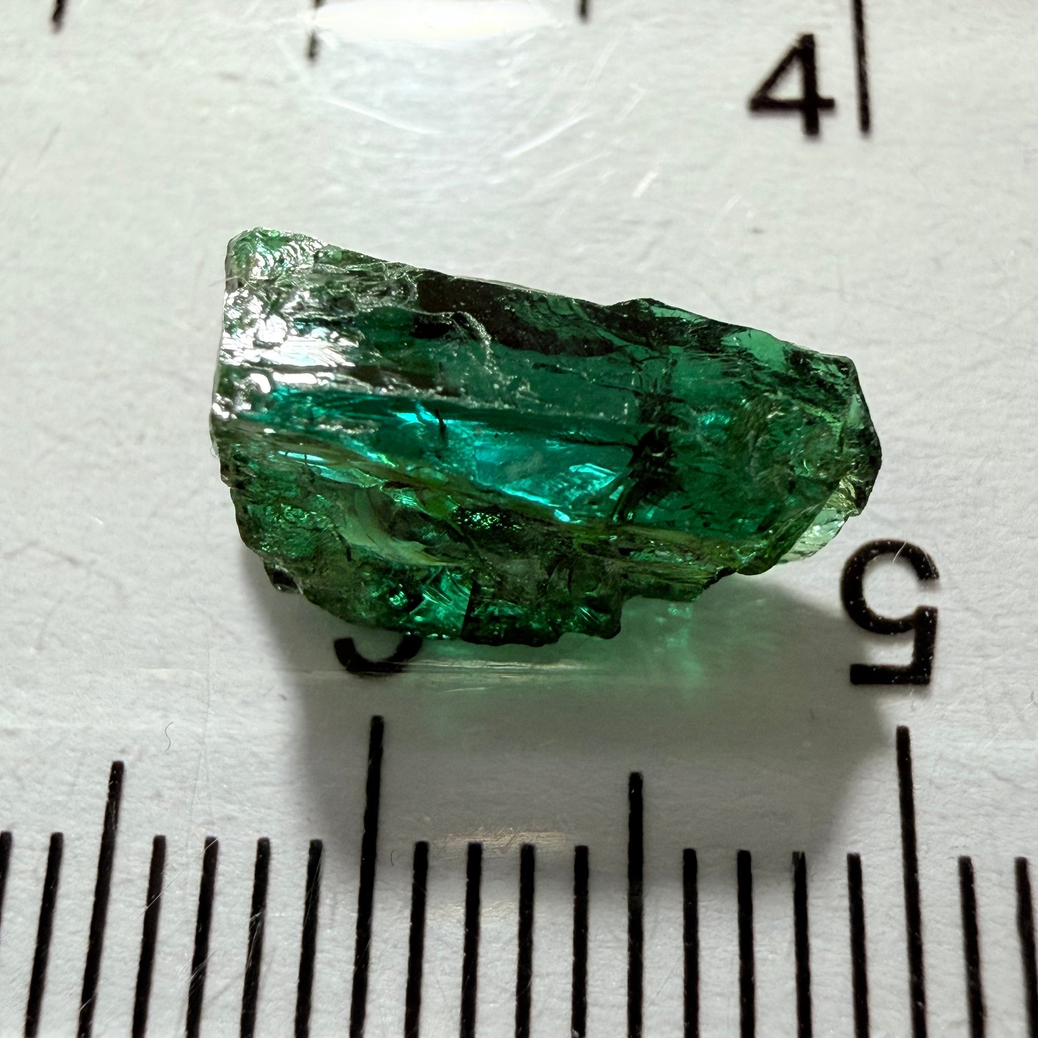 Tanzanite / Zoisite Crystal Specimen, 3.41ct, Merelani, Tanzania. Unheated Unheated, faceting portion in the center, major crack on the side circled in next pic