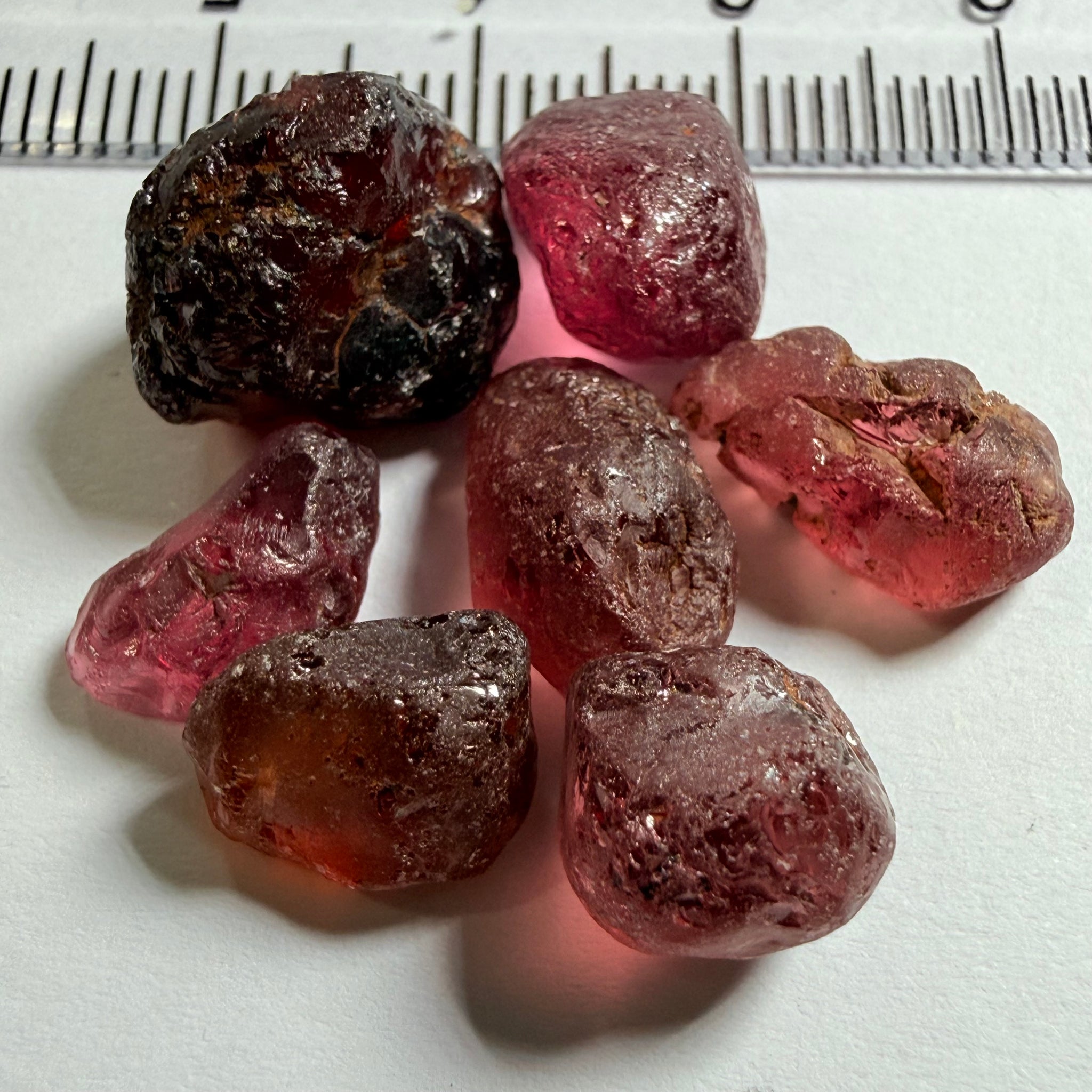 Tanzanian Garnet Lot, 51.40ct, Different locations in Tanzania, Untreated Unheated, slightly to moderately included stones, all Facetable, some are flat shapes, 4.08ct-14.39ct