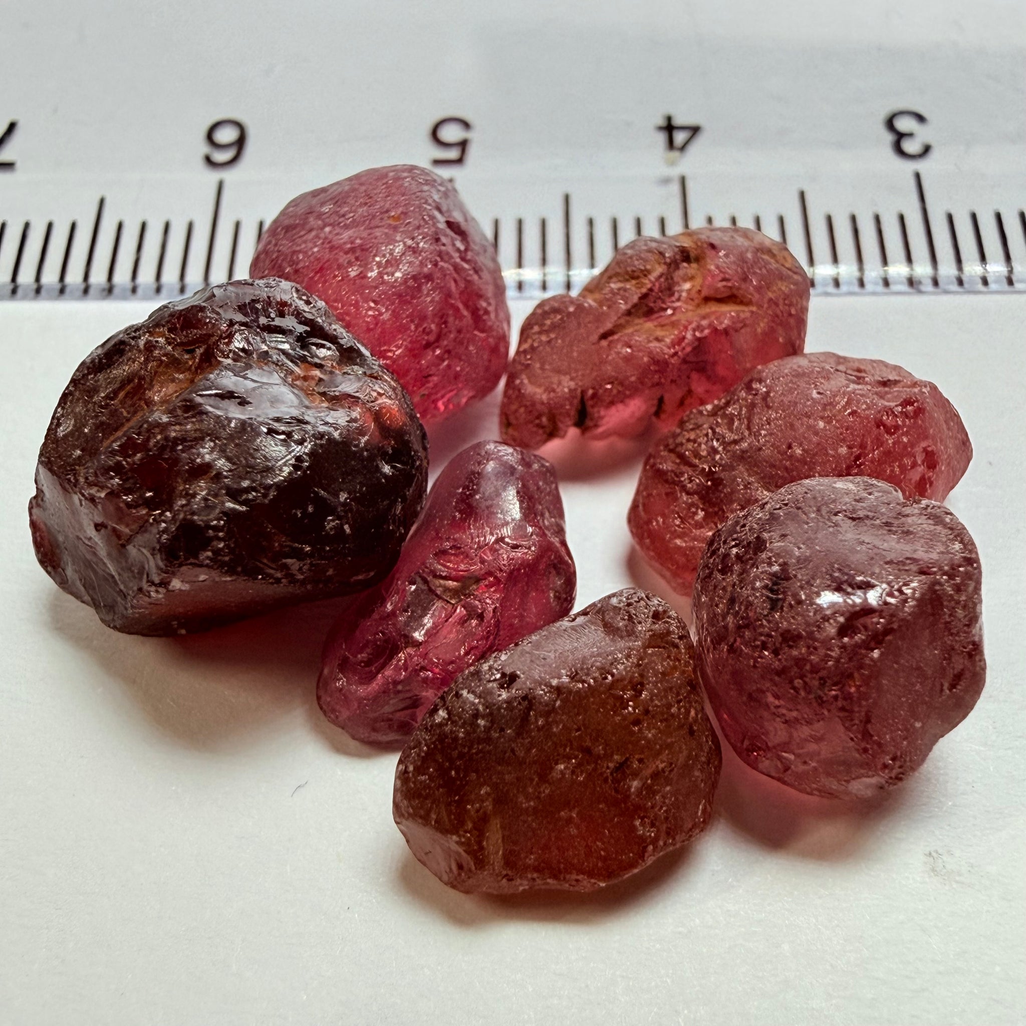 Tanzanian Garnet Lot, 51.40ct, Different locations in Tanzania, Untreated Unheated, slightly to moderately included stones, all Facetable, some are flat shapes, 4.08ct-14.39ct
