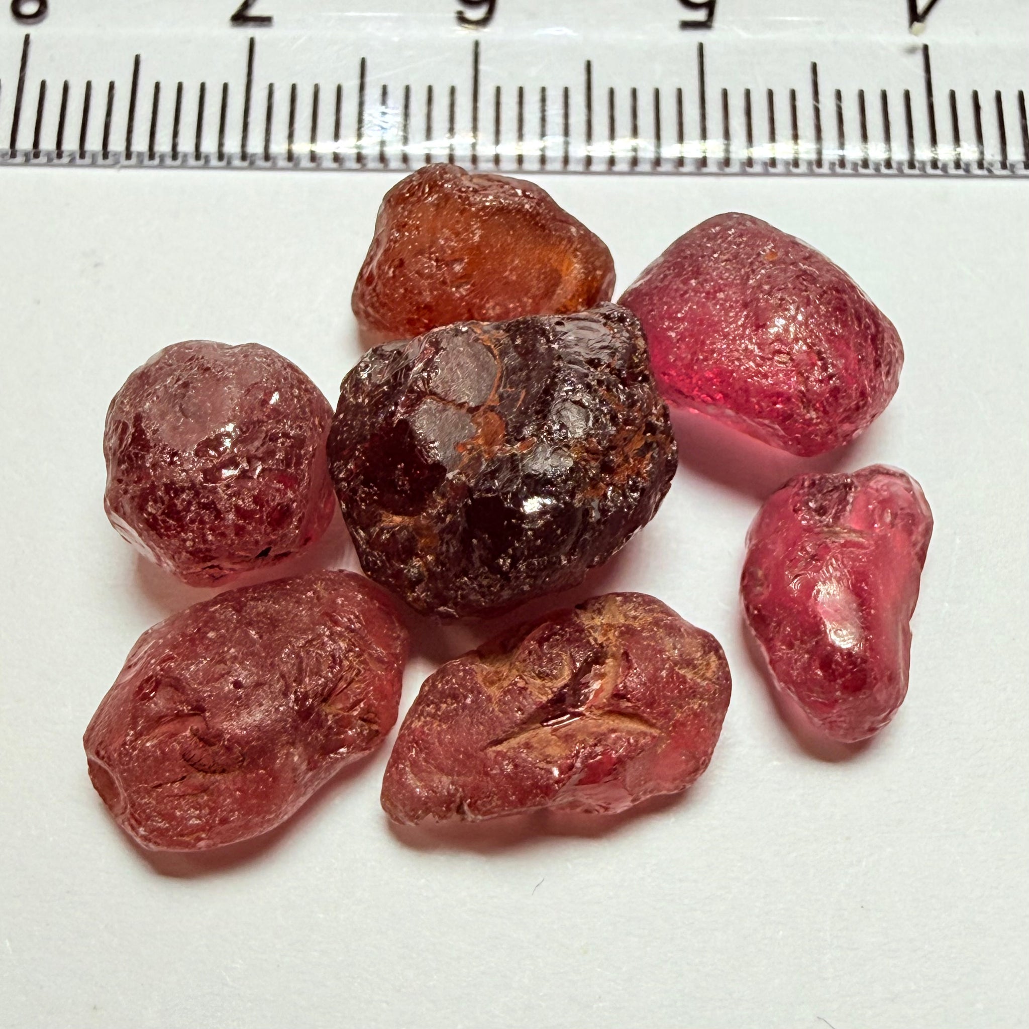 Tanzanian Garnet Lot, 51.40ct, Different locations in Tanzania, Untreated Unheated, slightly to moderately included stones, all Facetable, some are flat shapes, 4.08ct-14.39ct