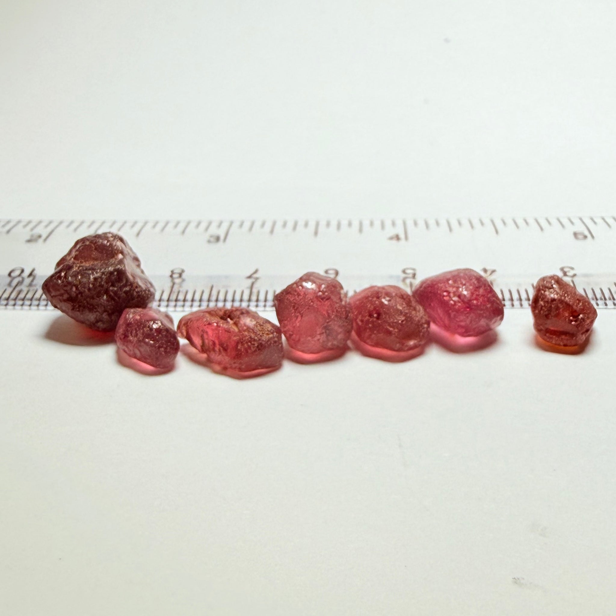 Tanzanian Garnet Lot, 51.40ct, Different locations in Tanzania, Untreated Unheated, slightly to moderately included stones, all Facetable, some are flat shapes, 4.08ct-14.39ct