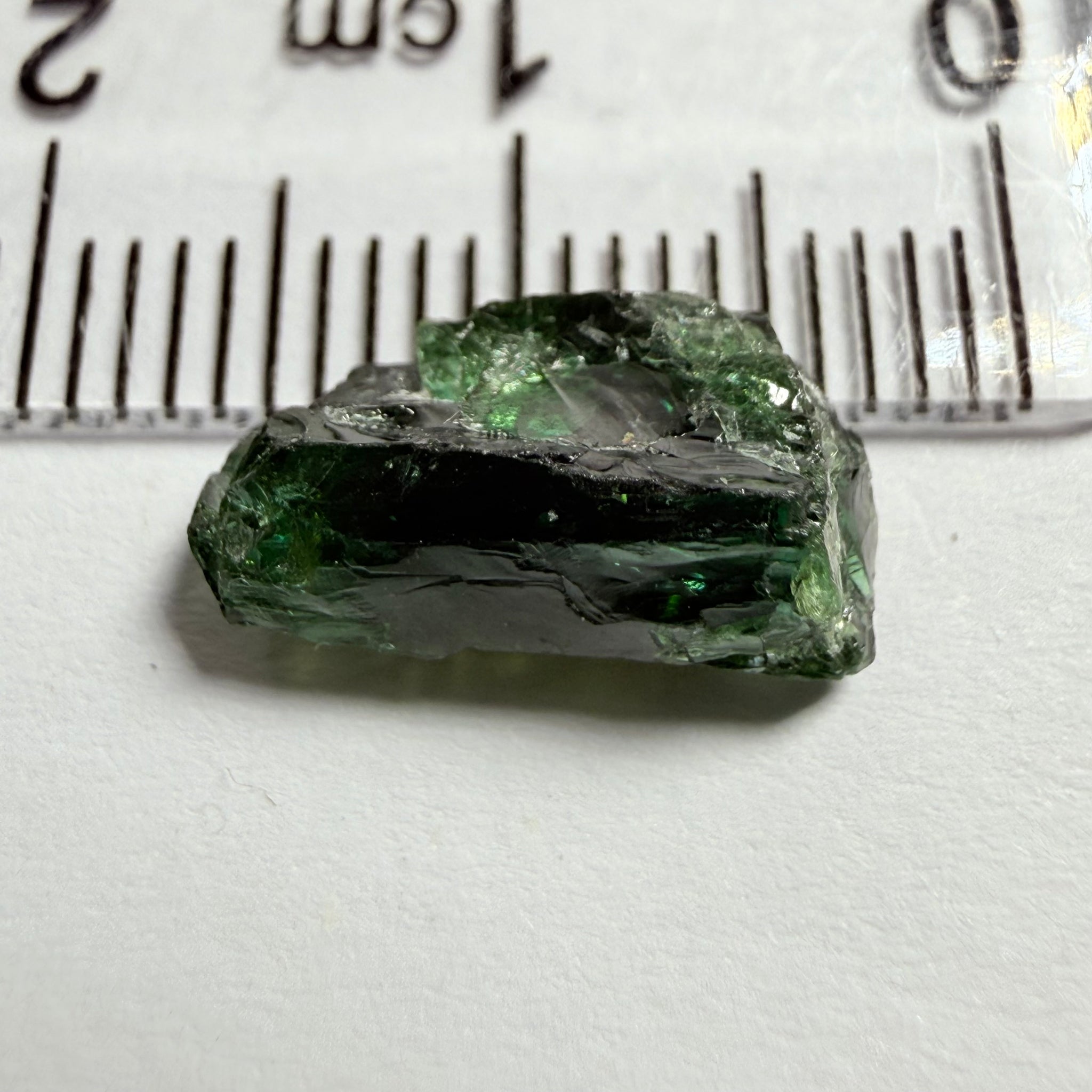 Tanzanite / Zoisite Crystal Specimen, 3.41ct, Merelani, Tanzania. Unheated Unheated, faceting portion in the center, major crack on the side circled in next pic