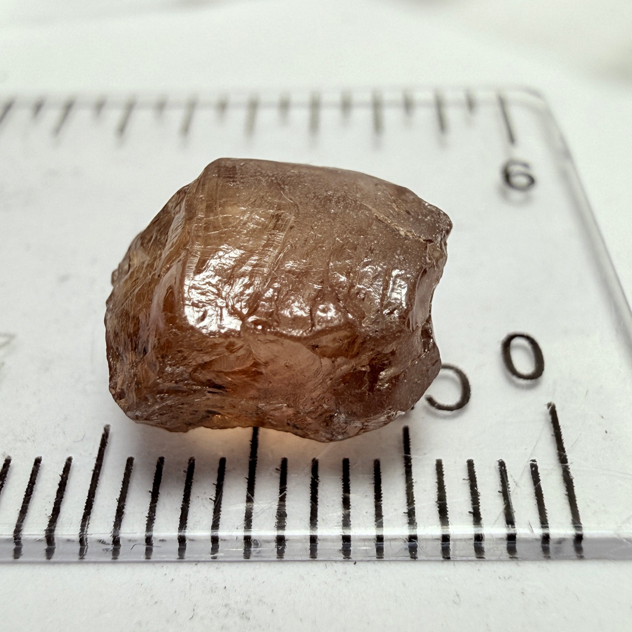 Colour Change Garnet, 6.75ct, Tanzania, Untreated Unheated, silky with slight inclusions on the outside, I have circled where the inclusions are, see other photos, the base colour in normal room light is the second pic