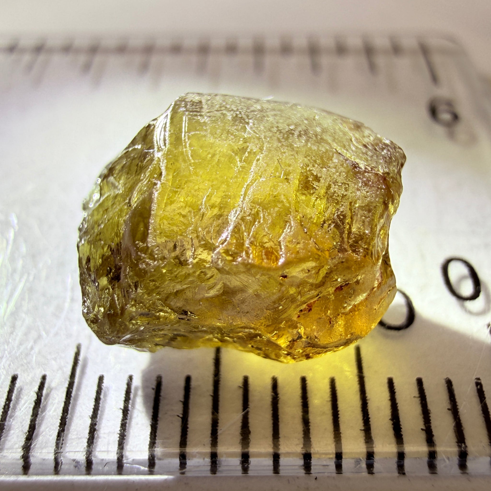 Colour Change Garnet, 6.75ct, Tanzania, Untreated Unheated, silky with slight inclusions on the outside, I have circled where the inclusions are, see other photos, the base colour in normal room light is the second pic