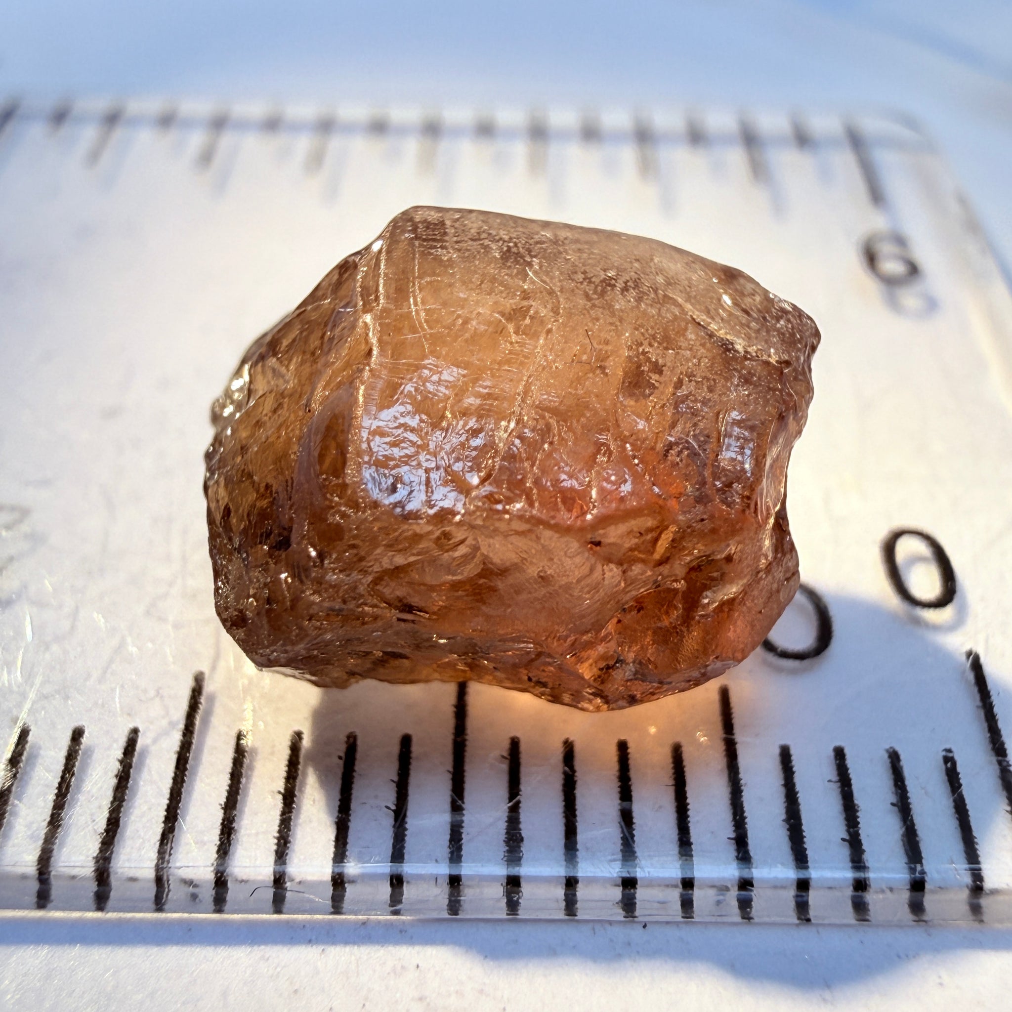 Colour Change Garnet, 6.75ct, Tanzania, Untreated Unheated, silky with slight inclusions on the outside, I have circled where the inclusions are, see other photos, the base colour in normal room light is the second pic