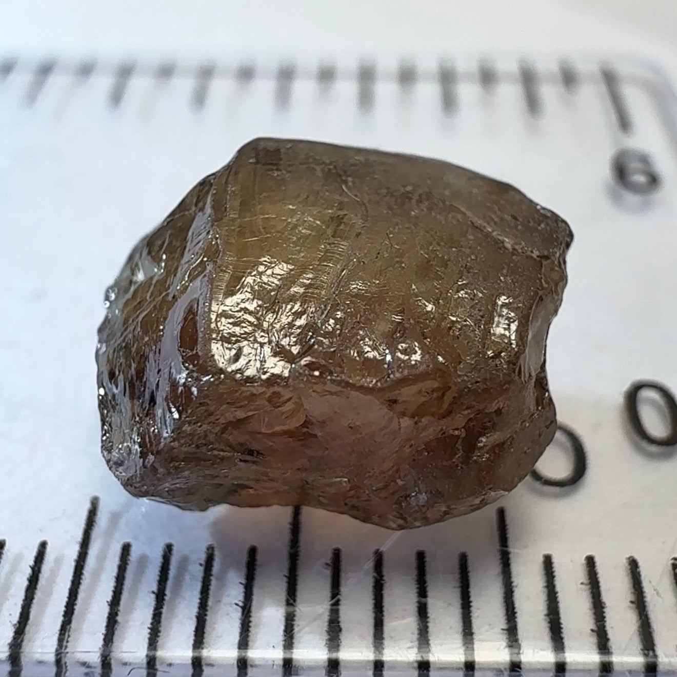 Colour Change Garnet, 6.75ct, Tanzania, Untreated Unheated, silky with slight inclusions on the outside, I have circled where the inclusions are, see other photos, the base colour in normal room light is the second pic