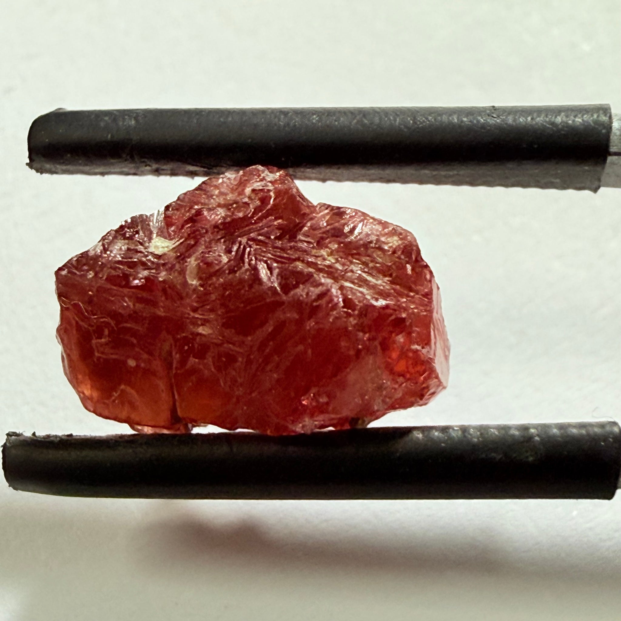 Umba Sapphire, 6.96ct, Umba, Tanzania, Untreated Unheated, surface gunk that will need to be removed on preform, inside its cloudy with no inclusions once the stuff on the skin is removed, see pics and backlit