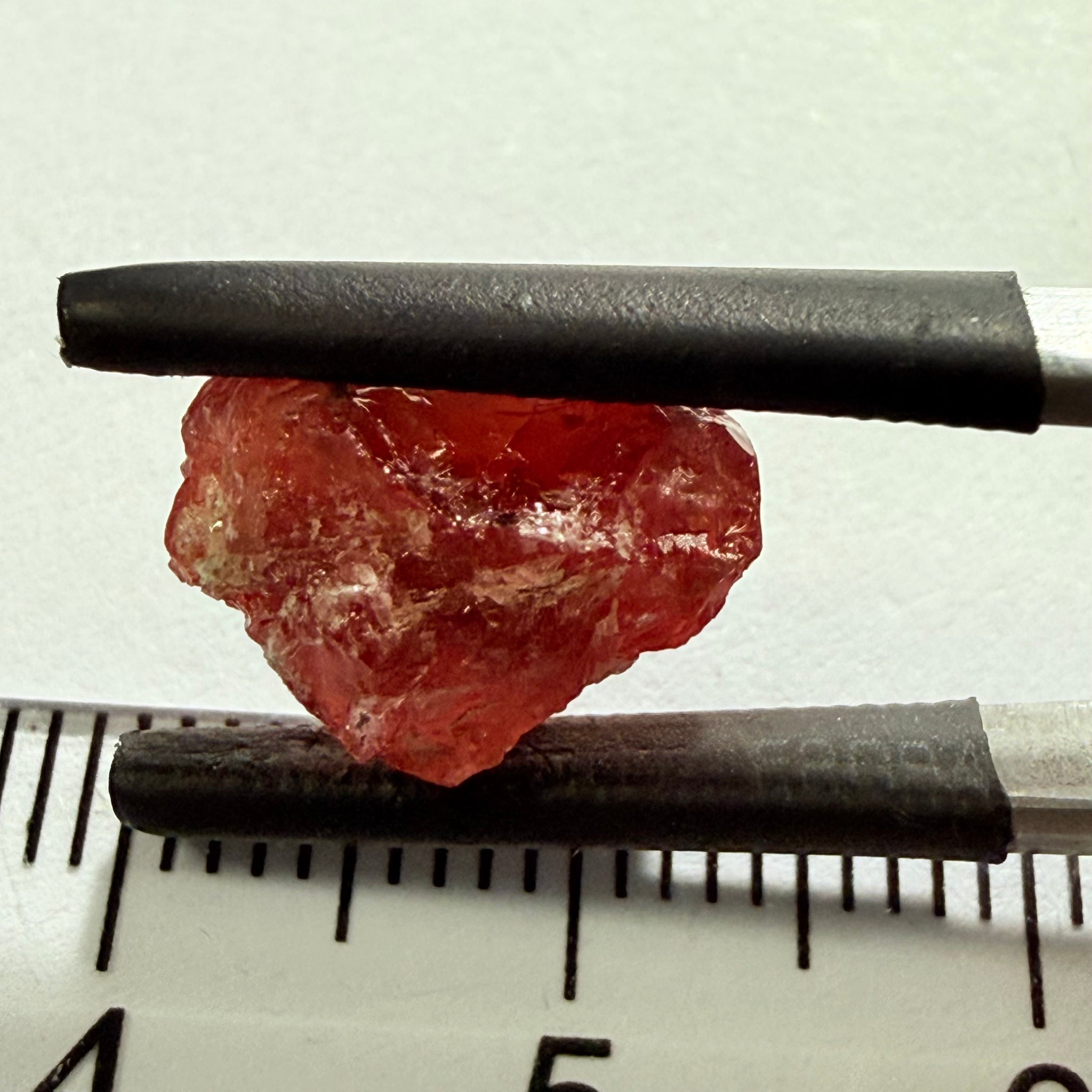 Umba Sapphire, 6.96ct, Umba, Tanzania, Untreated Unheated, surface gunk that will need to be removed on preform, inside its cloudy with no inclusions once the stuff on the skin is removed, see pics and backlit