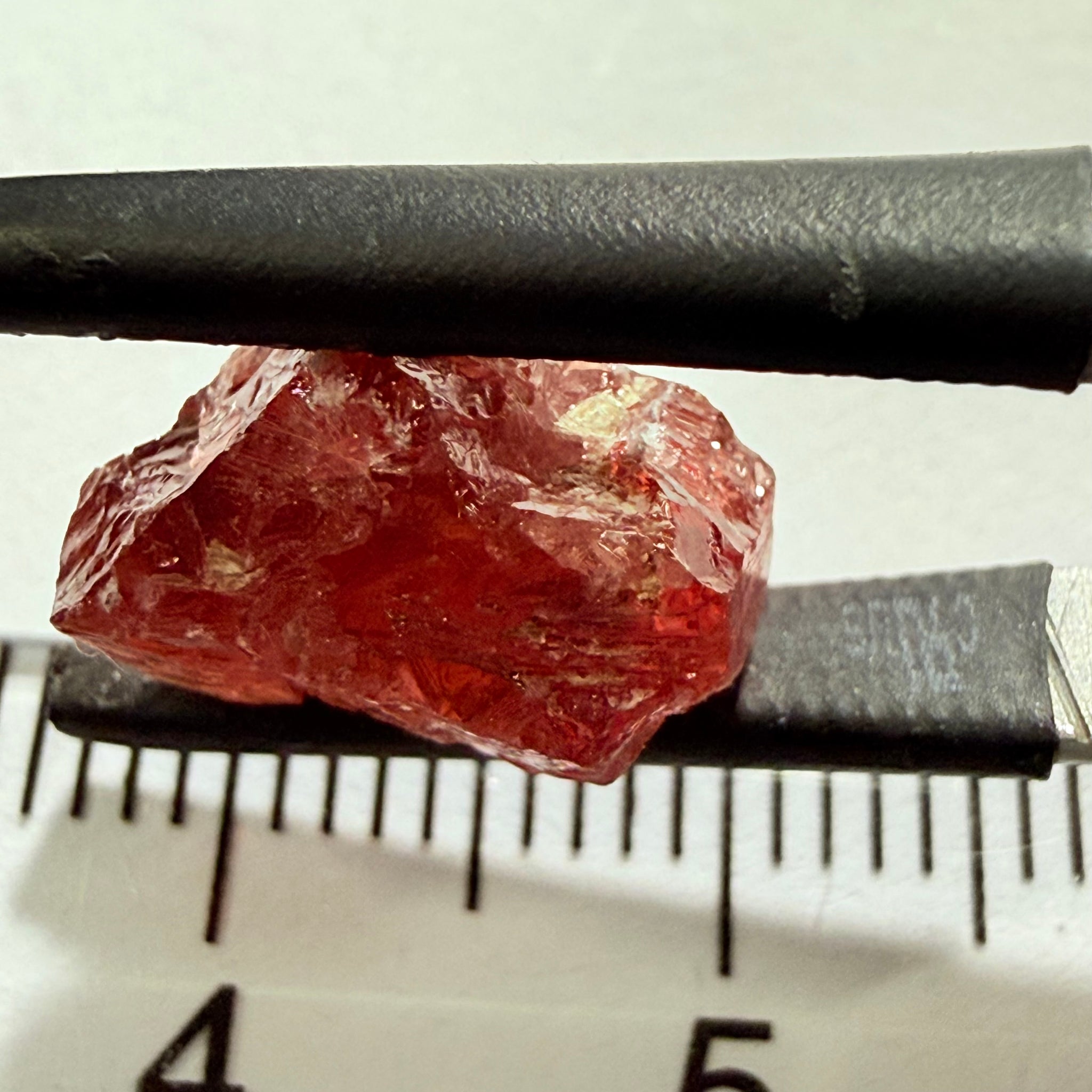 Umba Sapphire, 6.96ct, Umba, Tanzania, Untreated Unheated, surface gunk that will need to be removed on preform, inside its cloudy with no inclusions once the stuff on the skin is removed, see pics and backlit