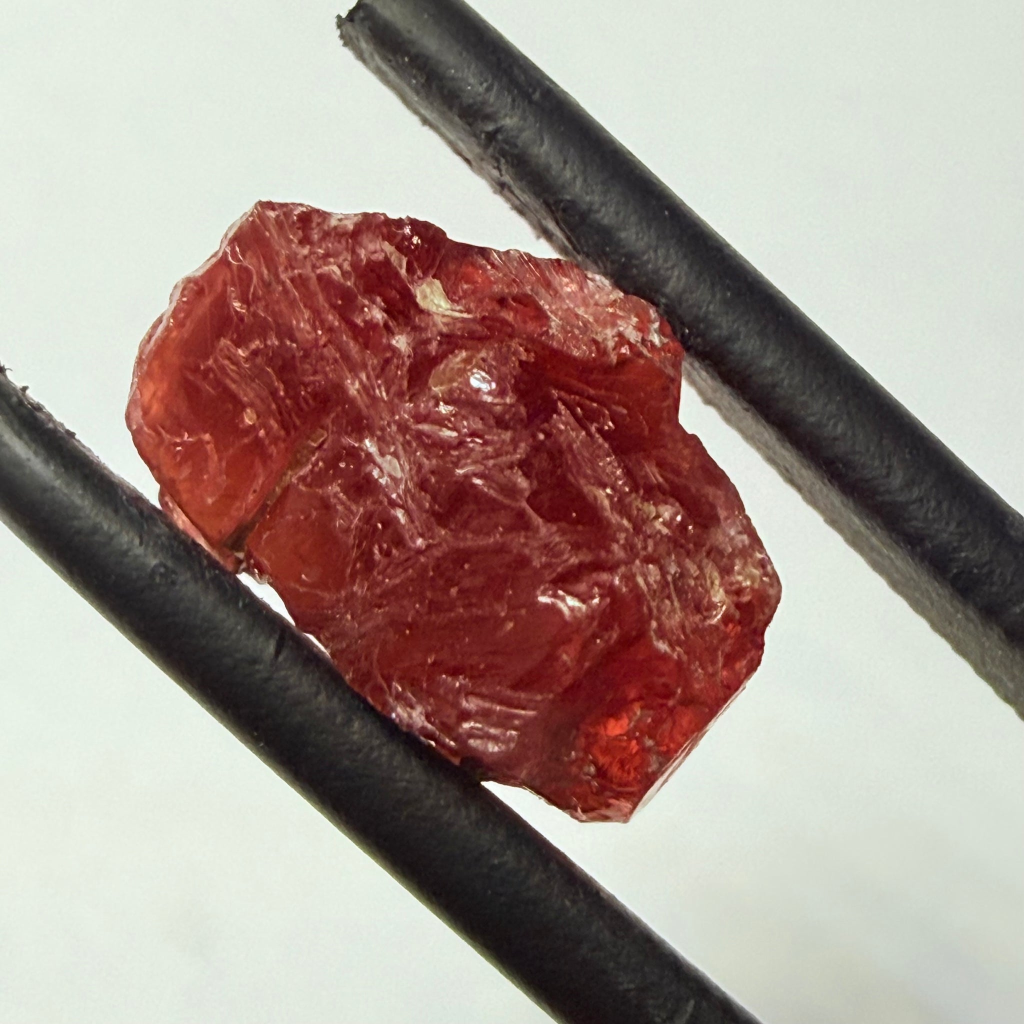 Umba Sapphire, 6.96ct, Umba, Tanzania, Untreated Unheated, surface gunk that will need to be removed on preform, inside its cloudy with no inclusions once the stuff on the skin is removed, see pics and backlit