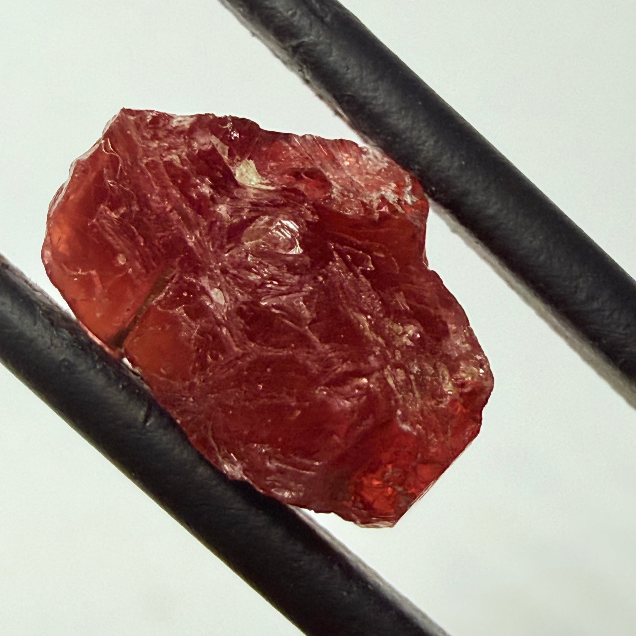 Umba Sapphire, 6.96ct, Umba, Tanzania, Untreated Unheated, surface gunk that will need to be removed on preform, inside its cloudy with no inclusions once the stuff on the skin is removed, see pics and backlit