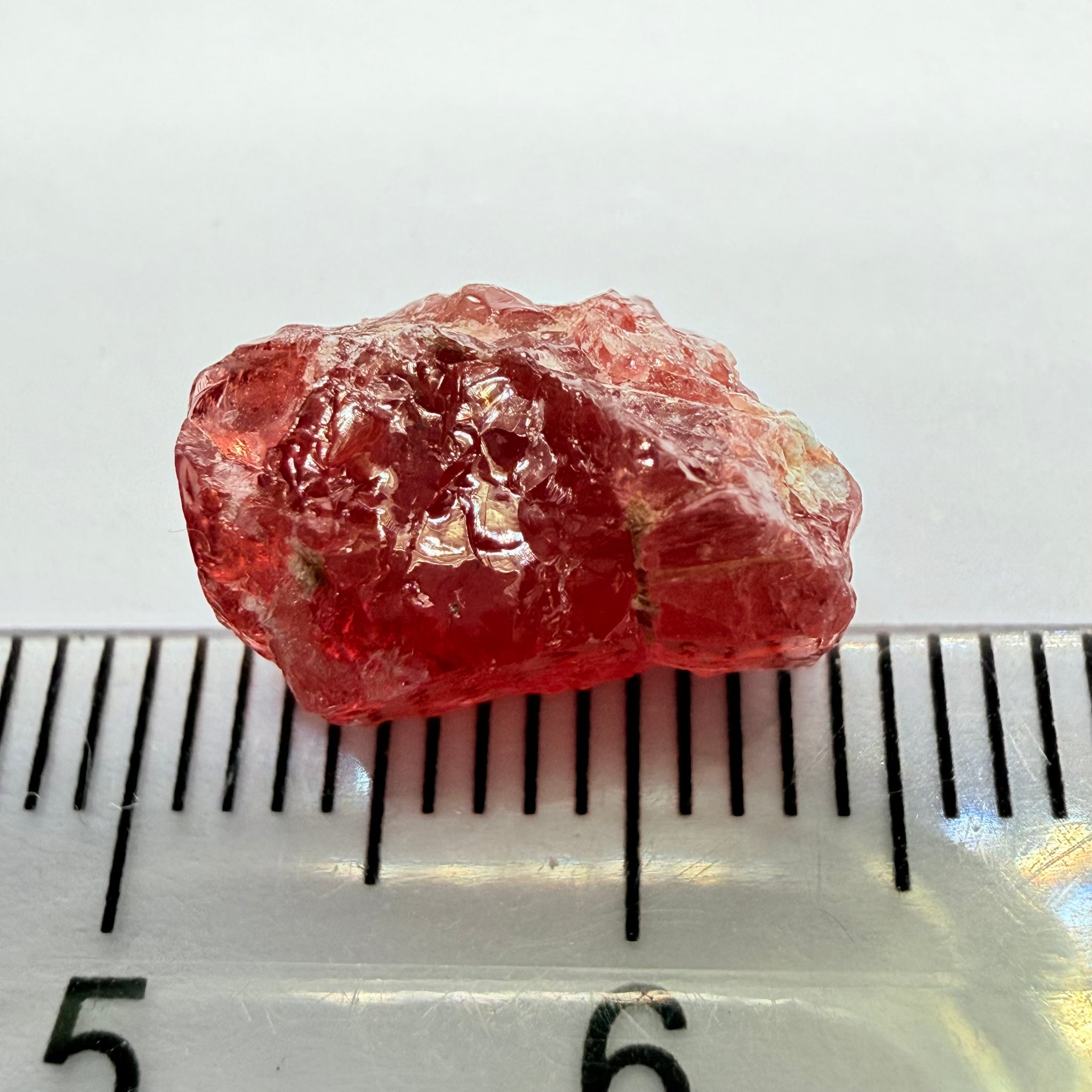 Umba Sapphire, 6.96ct, Umba, Tanzania, Untreated Unheated, surface gunk that will need to be removed on preform, inside its cloudy with no inclusions once the stuff on the skin is removed, see pics and backlit