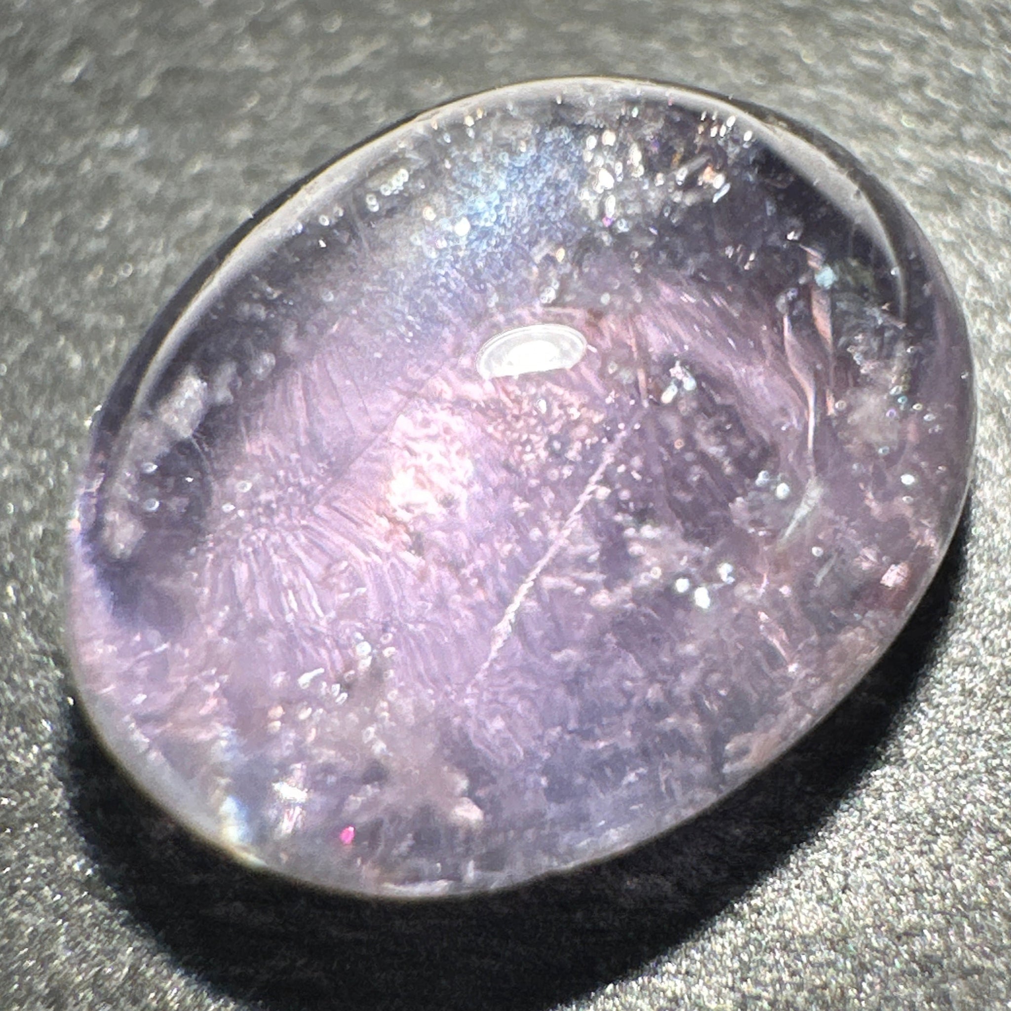 Sapphire Cabochon, 3.49ct, Umba Valley, Tanzania. Untreated Unheated. Yes that's a moving spot caused by silk positioning!