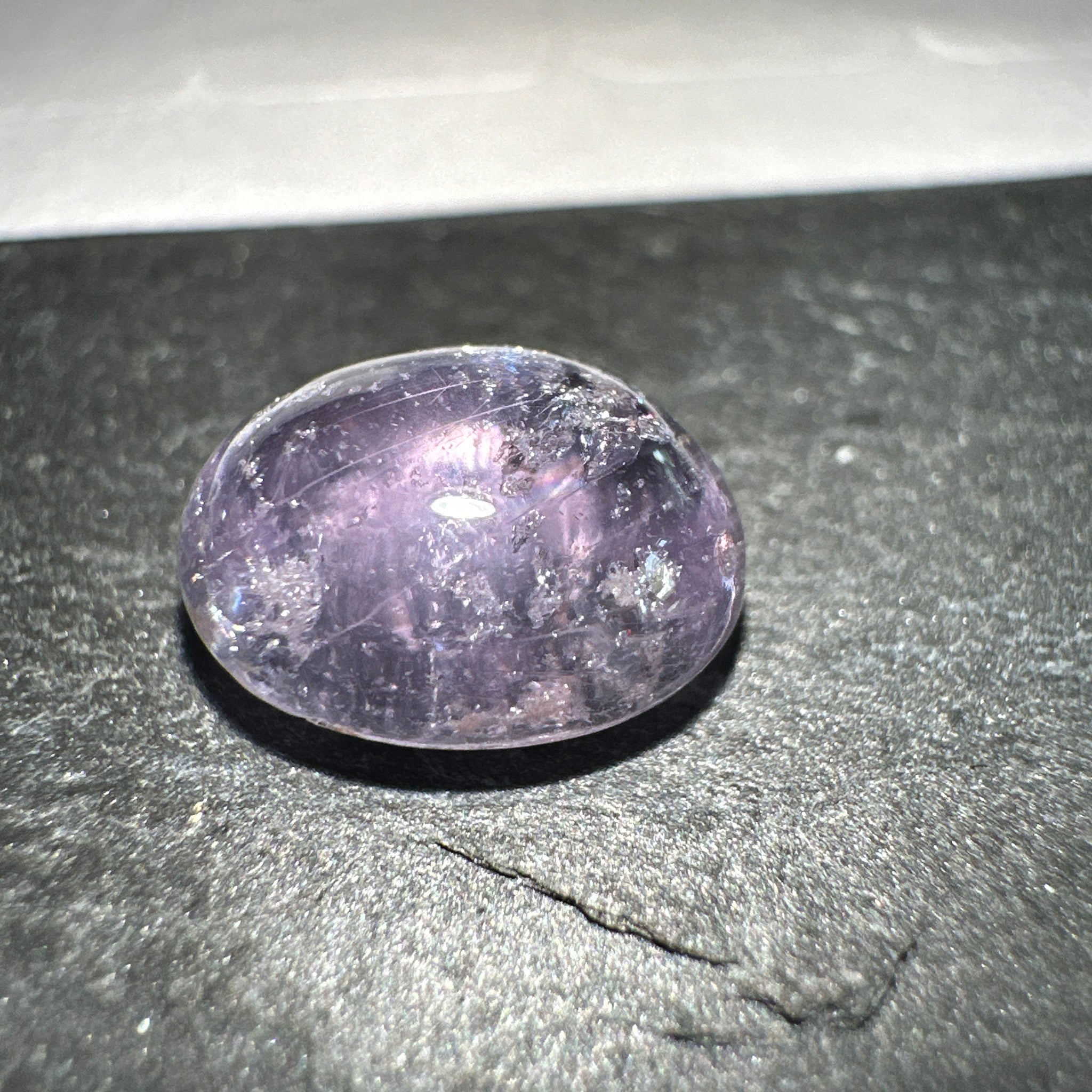 Sapphire Cabochon, 3.49ct, Umba Valley, Tanzania. Untreated Unheated. Yes that's a moving spot caused by silk positioning!