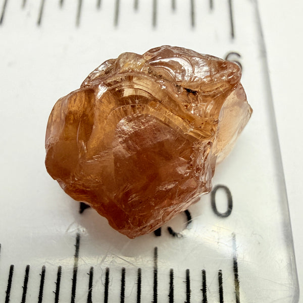 Peach Malaya Garnet, 8.21ct, silk and slight needles but no inclusions, Unheated Untreated, Umba Valley Tanzania, complicated shape.