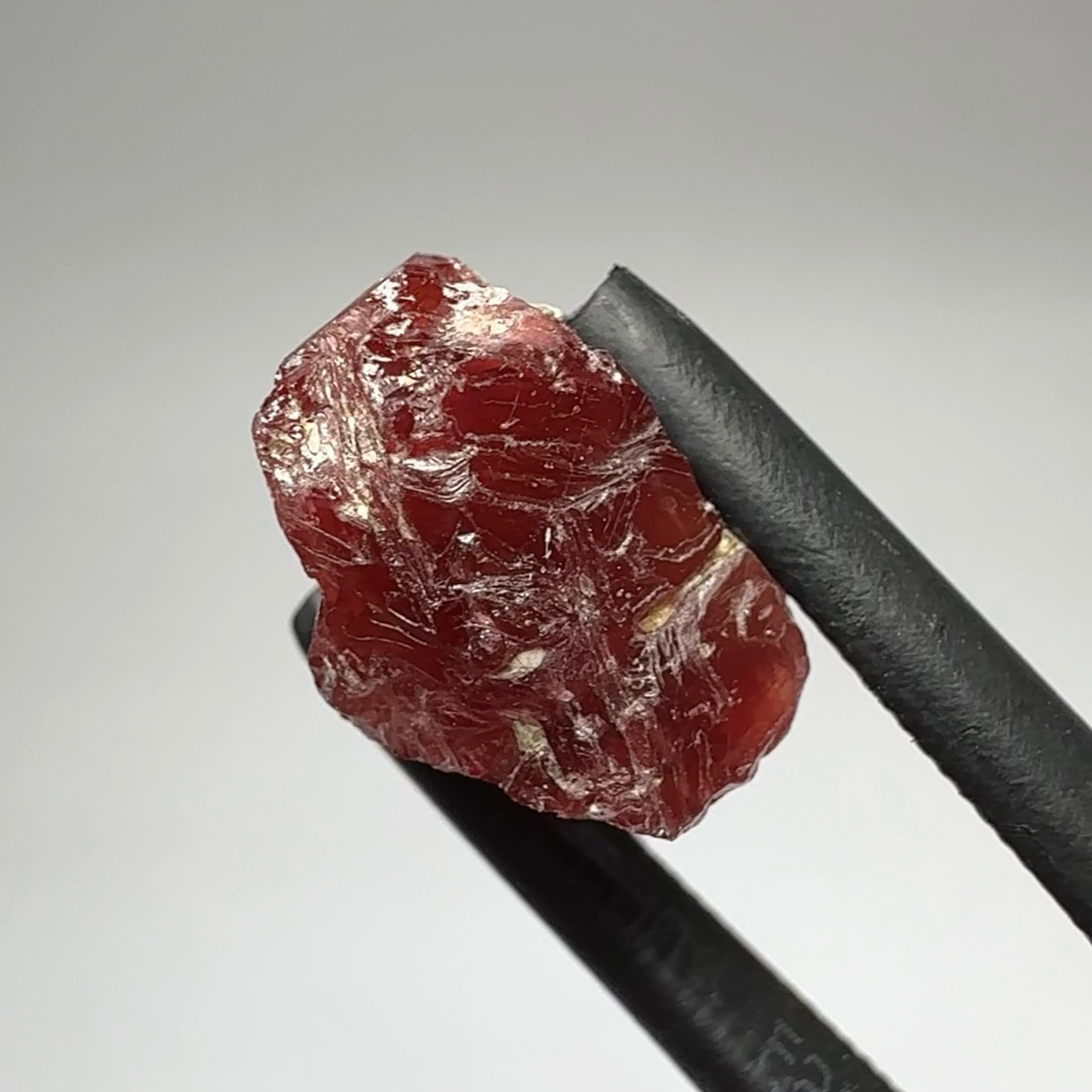 Umba Sapphire, 6.96ct, Umba, Tanzania, Untreated Unheated, surface gunk that will need to be removed on preform, inside its cloudy with no inclusions once the stuff on the skin is removed, see pics and backlit