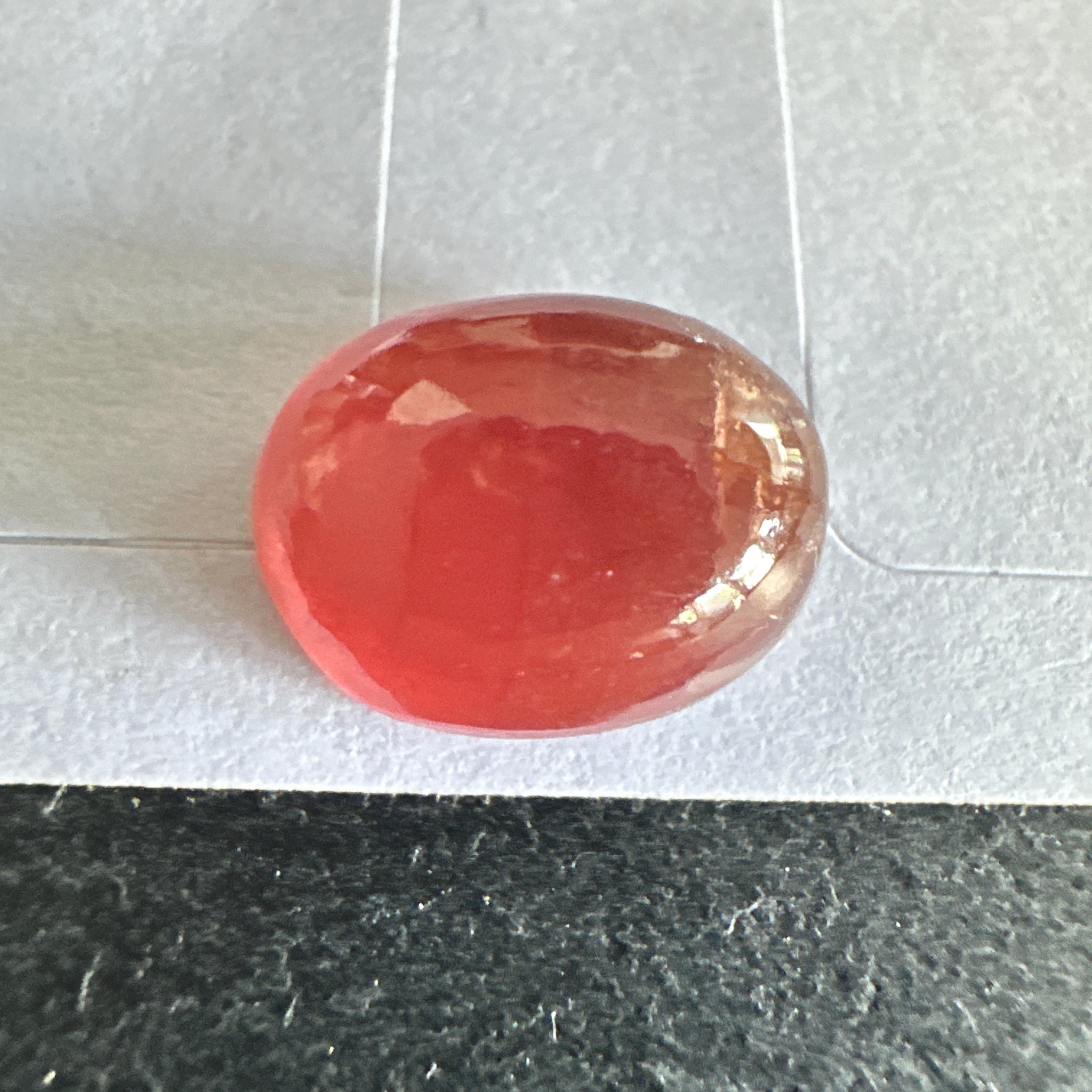 Padparadscha Sapphire Cabochon, 6.57ct, Tanzania, UNTREATED UNHEATED. 11 x 8.2 x 5 mm, seems to have a colour shift