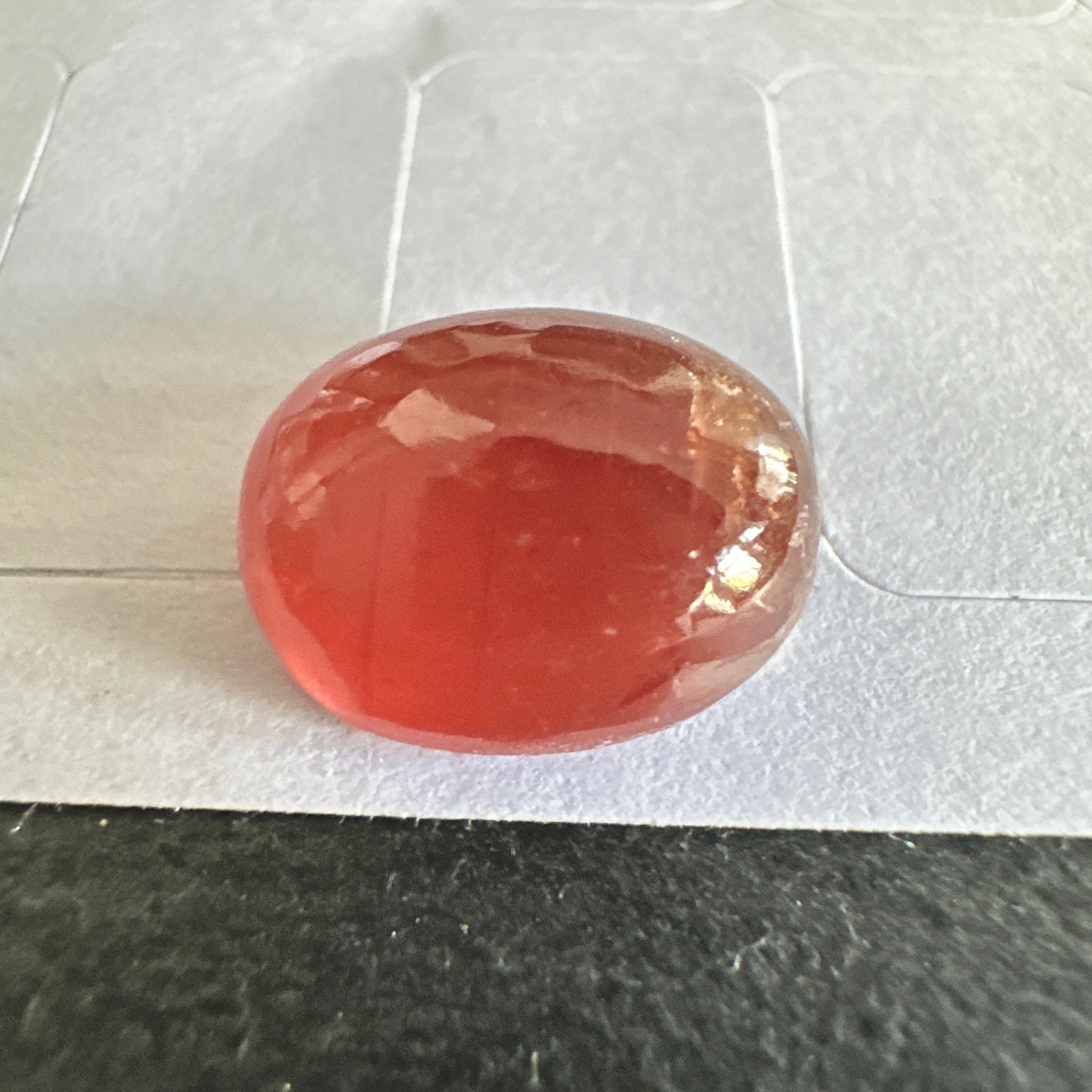Padparadscha Sapphire Cabochon, 6.57ct, Tanzania, UNTREATED UNHEATED. 11 x 8.2 x 5 mm, seems to have a colour shift