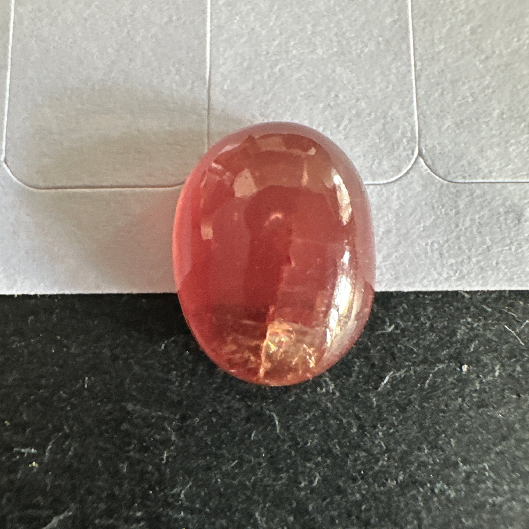 Padparadscha Sapphire Cabochon, 6.57ct, Tanzania, UNTREATED UNHEATED. 11 x 8.2 x 5 mm, seems to have a colour shift