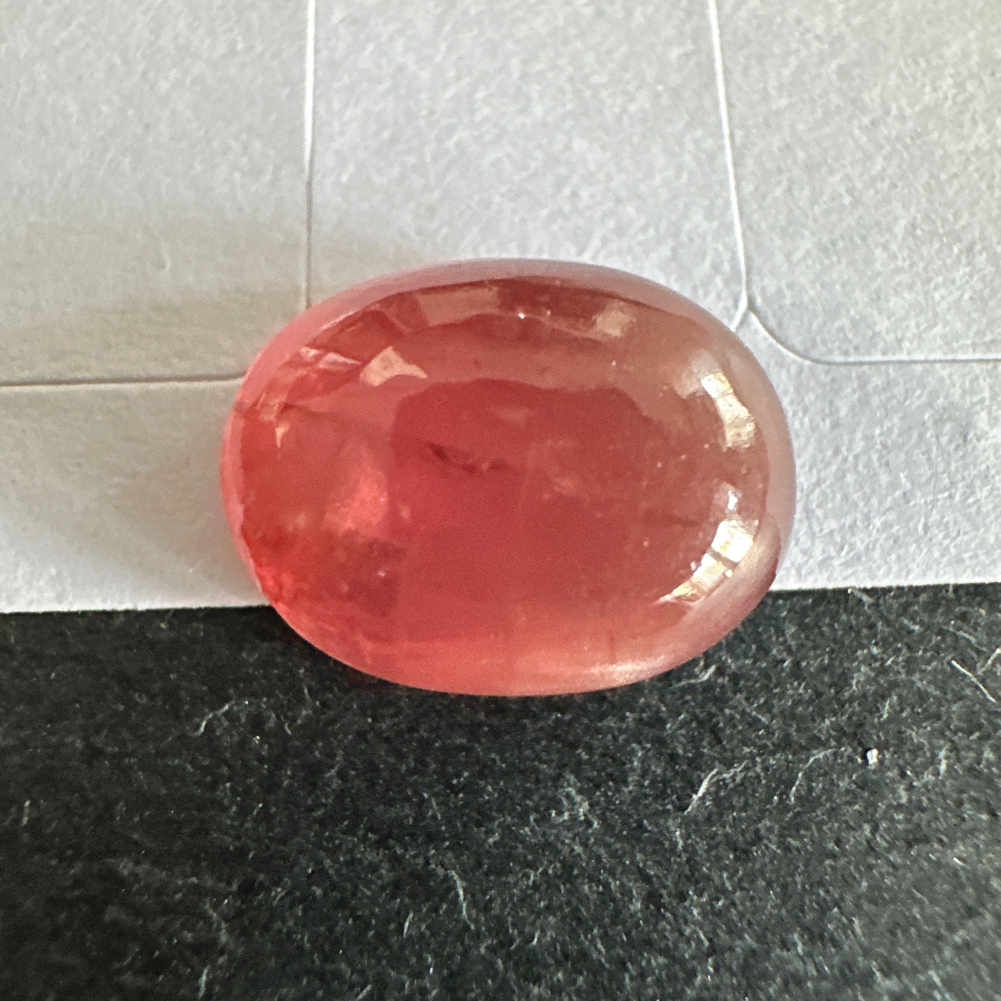 Padparadscha Sapphire Cabochon, 6.57ct, Tanzania, UNTREATED UNHEATED. 11 x 8.2 x 5 mm, seems to have a colour shift